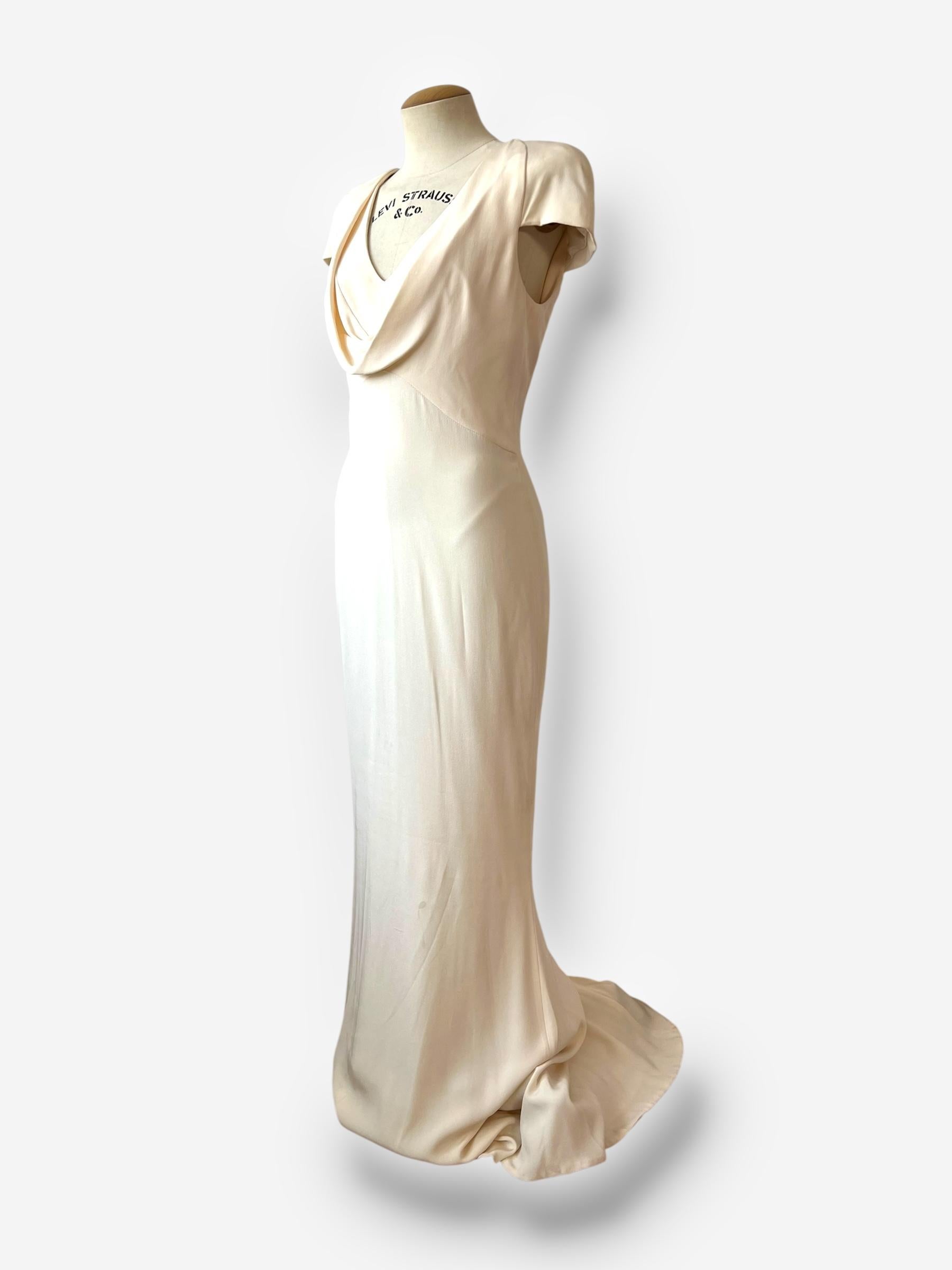 
This exquisite silk-crepe gown from Alexander McQueen's 2011 collection is a commercial version of the dress worn by Pippa Middleton at the royal wedding of Prince William and Catherine Middleton. Designed by Sarah Burton, the dress gained global