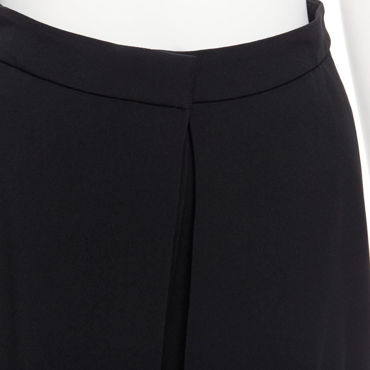 ALEXANDER MCQUEEN 2016 negro doble solapa frontal minimal vestido skort IT38 XS
Referencia: AAWC/A00957
Marca: Alexander McQueen
Diseñadora: Sarah Burton
Colección: 2016
Material: Viscosa, mezcla
Color: Negro
Patrón: Sólido
Cierre: Bragueta con