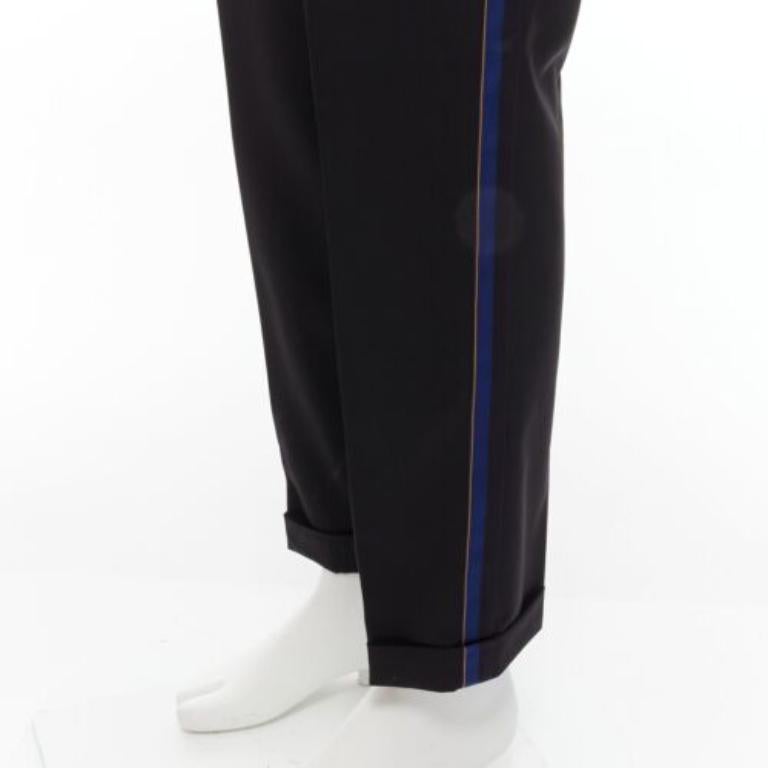 Noir Pantalon ALEXANDER MCQUEEN 2016 avec bordure bleue en laine noire et jaune IT48 M en vente