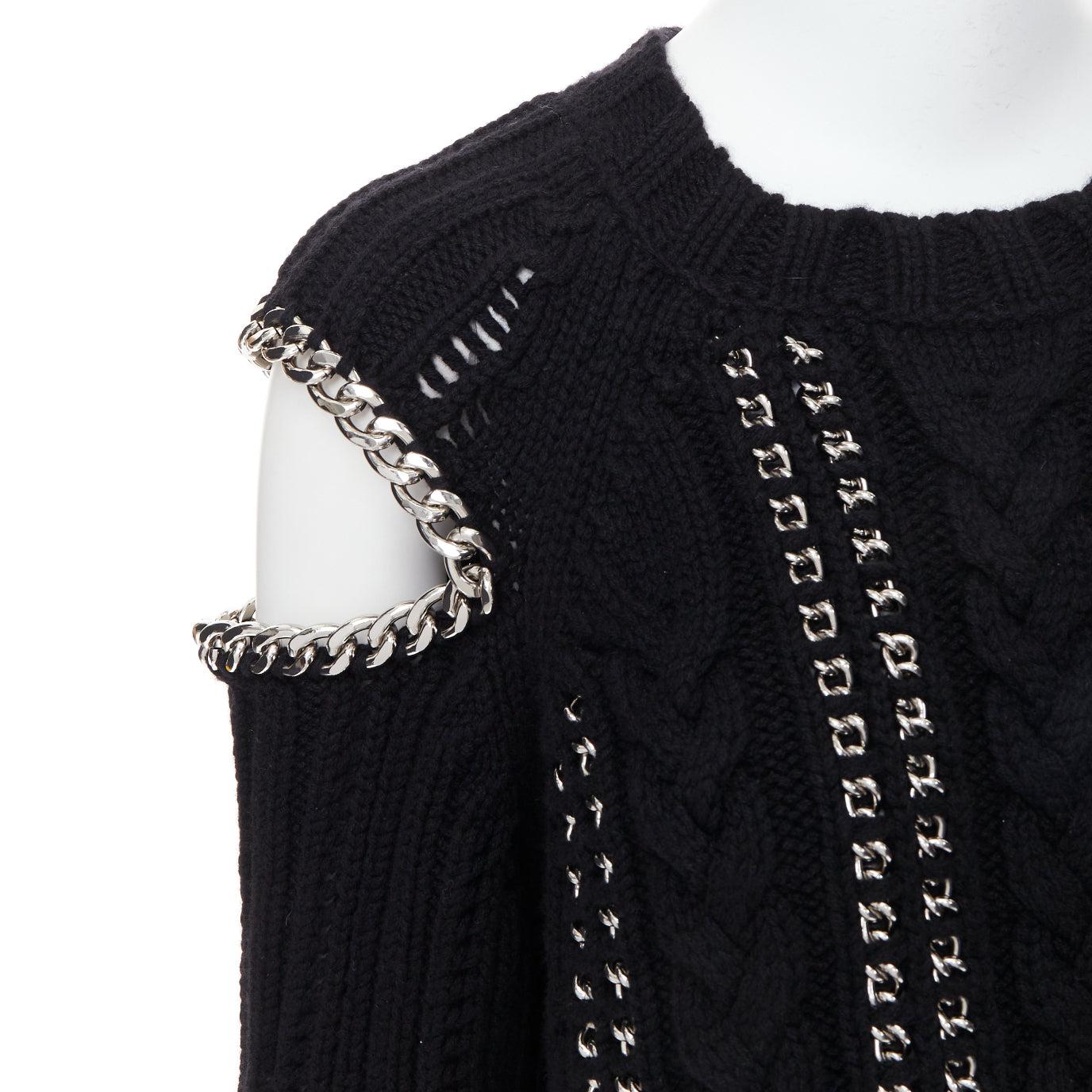 ALEXANDER MCQUEEN 2018 100% cashmere silver chain cold shoulder sweater S
Reference: TGAS/E00816
Brand: Alexander McQueen
Designer: Sarah Burton
Material: Cashmere, Metal
Color: Black, Silver
Pattern: Solid
Closure: Pullover
Extra Details: rafted