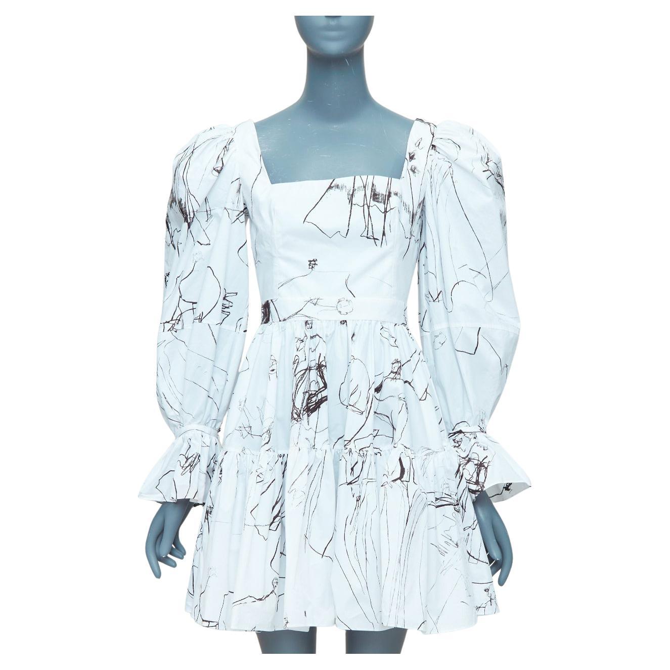 ALEXANDER MCQUEEN 2019 vestido negro de manga abullonada con estampado de ilustración de bocetos IT38 XS en venta