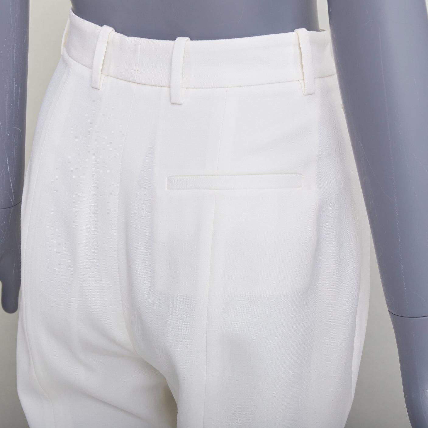 Alexander McQueen 2020 pantalon en laine vierge crème à coutures latérales incurvées IT38 XS
Référence : SNKO/A00589
Marque : Alexander McQueen
Designer : Sarah Burton
Collection : 2020
MATERIAL : Laine vierge
Couleur : Crème
Motif :