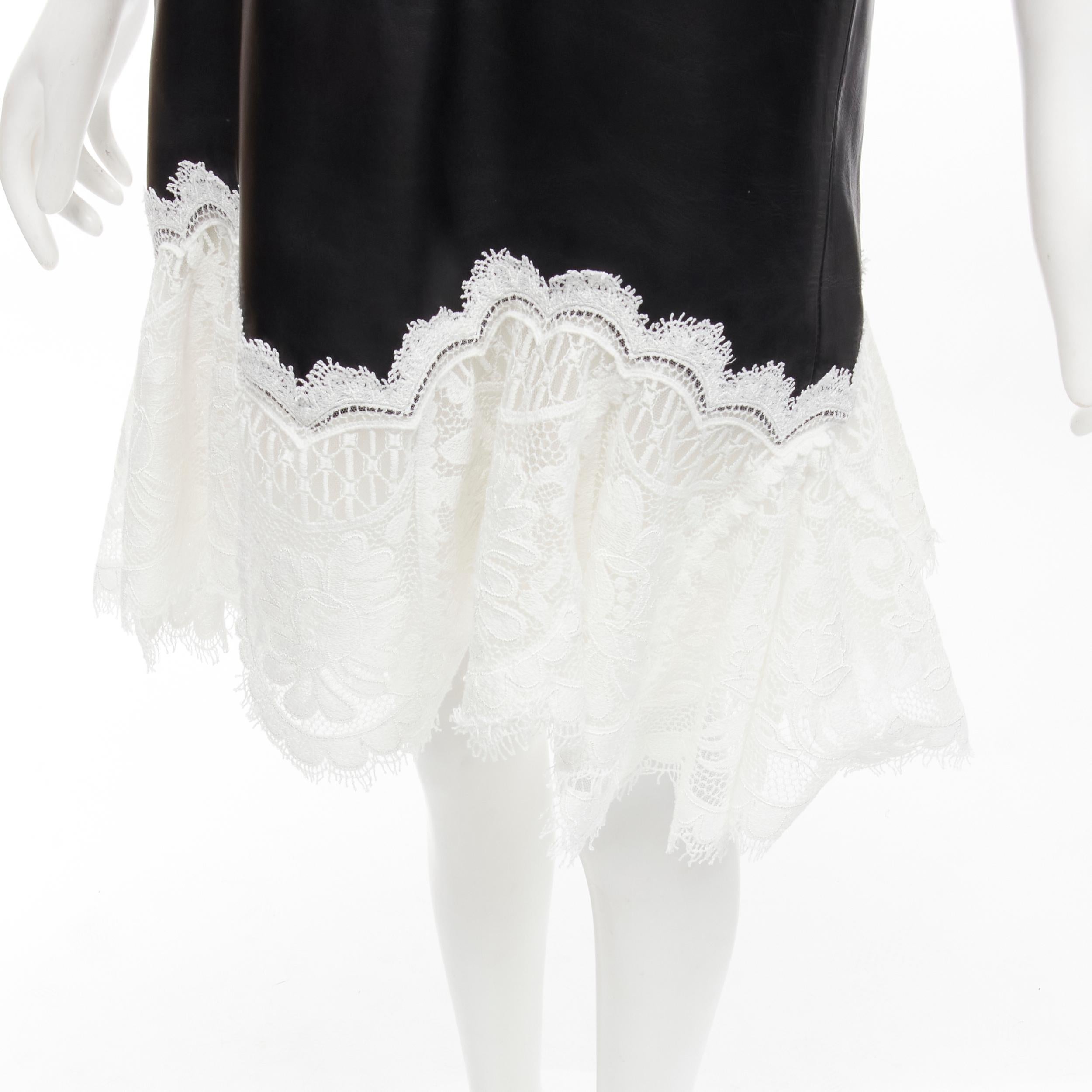 ALEXANDER MCQUEEN 2020 Runway black leather bustier white lace dress IT38 S
Brand: Alexander McQueen
Collection: 2020 
Material: Leather
Color: Black
Pattern: Solid
Closure: Zip
Extra Detail: Structured stiff leather bustier construction. Soft