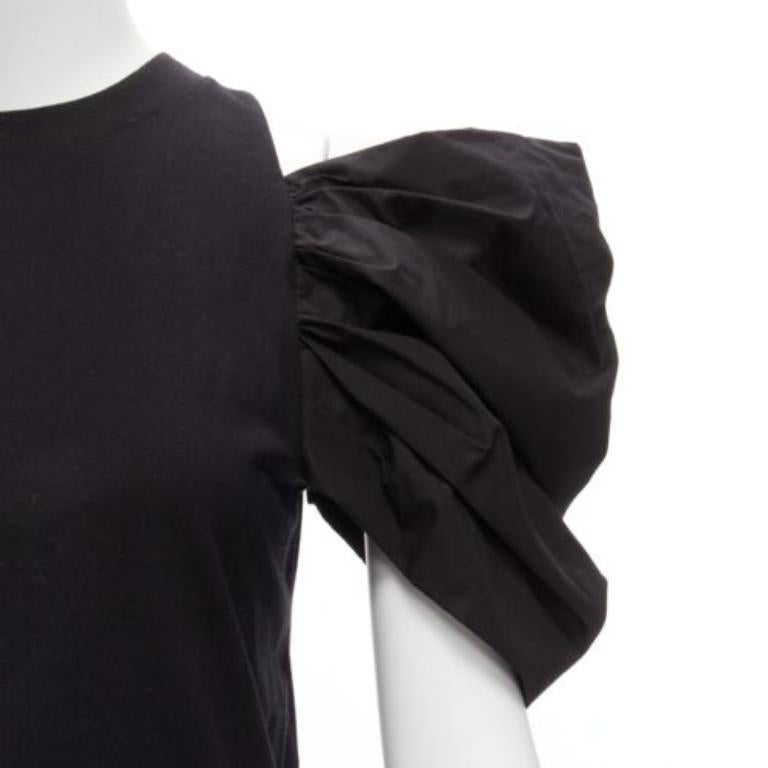 Alexander McQueen 2021 top nero con maniche a sbuffo ricamate IT38 XS
Riferimento: BSHW/A00028
Marchio: Alexander McQueen
Designer: Sarah Burton
Collezione: 2021
Materiale: Cotone
Colore: nero
Modello: Tinta unita
Chiusura: Pullover
Prodotto in: