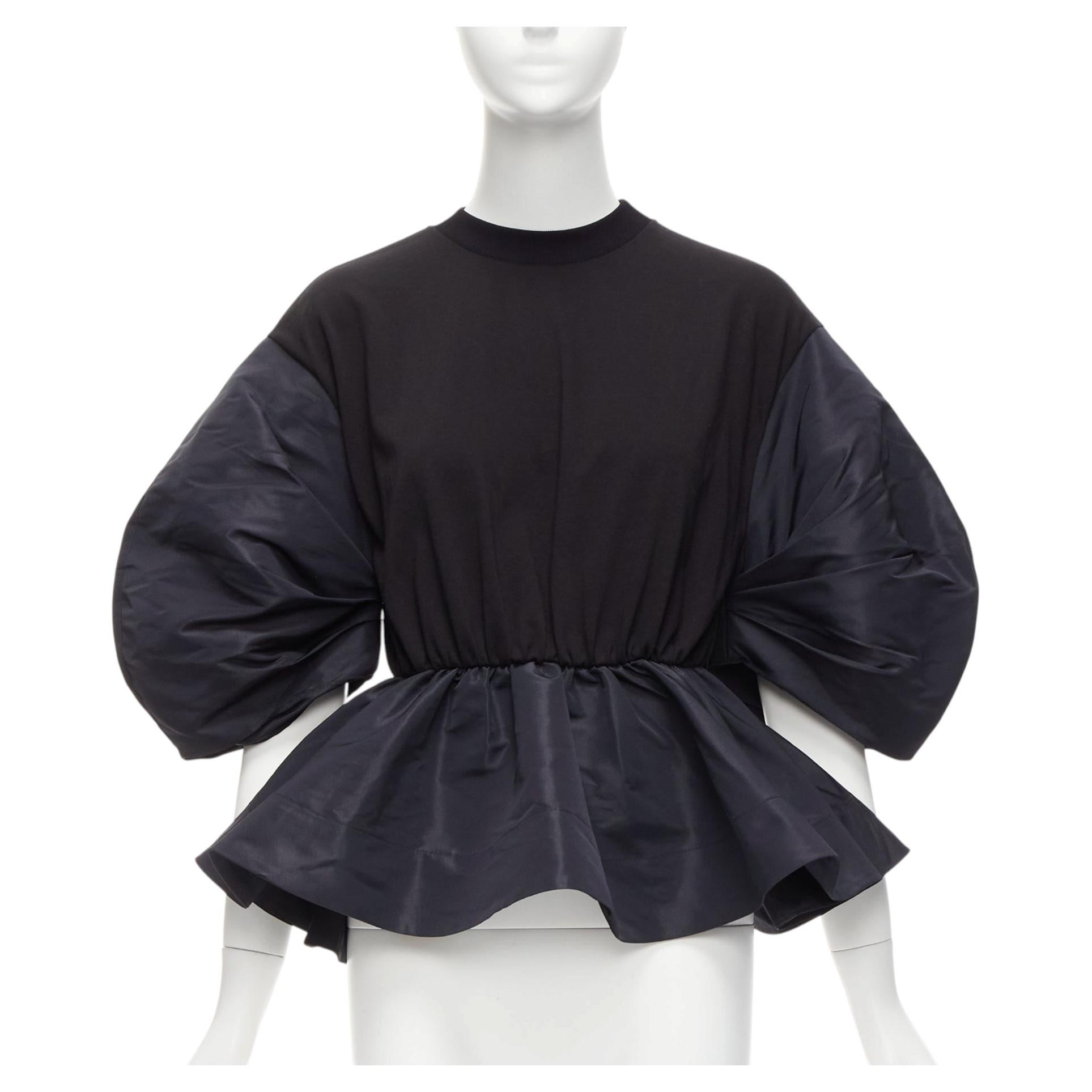 ALEXANDER MCQUEEN 2021 top negro redondo con mangas abullonadas y peplum en contraste IT36 XXS
