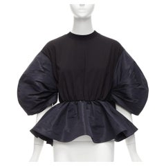 ALEXANDER MCQUEEN 2021 top negro redondo con mangas abullonadas y peplum en contraste IT36 XXS