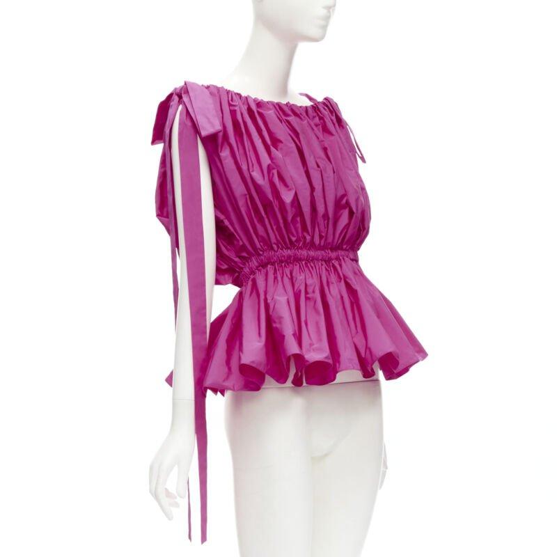 Rose ALEXANDER MCQUEEN Haut péplum rose fuschia froncé avec nœud papillon à l'épaule, Taille IT38 XS, 2021 en vente