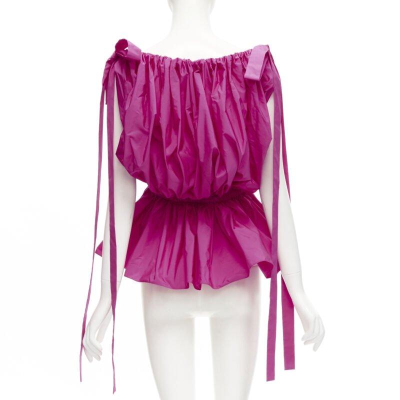 ALEXANDER MCQUEEN Haut péplum rose fuschia froncé avec nœud papillon à l'épaule, Taille IT38 XS, 2021 Pour femmes en vente