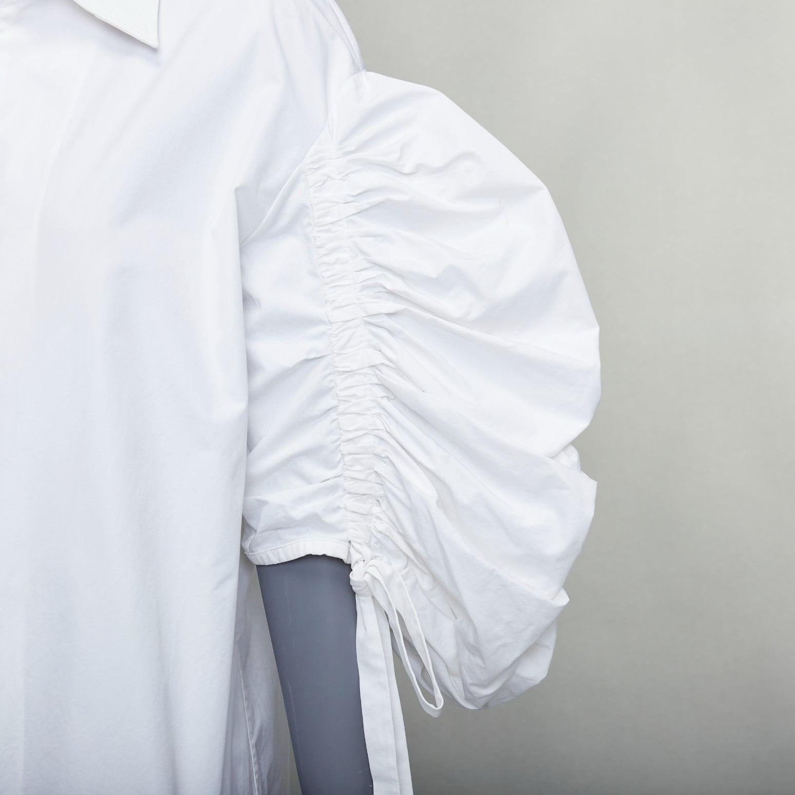 ALEXANDER MCQUEEN 2021 white cotton ruched puff sleeves zip up shirt IT40 S
Reference: KEDG/A00330
Brand: Alexander McQueen
Designer: Sarah Burton
Collection: 2021
Material: Cotton
Color: White, Silver
Pattern: Solid
Closure: Zip
Extra Details: