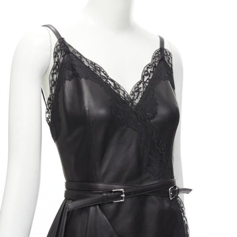 ALEXANDER MCQUEEN 2022 black leather lace asymmetric wrap draped dress IT38 XS
Reference: AAWC/A00189
Brand: Alexander McQueen
Designer: Sarah Burton
Collection: 2022
Material: Leather
Color: Black
Pattern: Solid
Closure: Zip
Lining:  Unlined
Extra