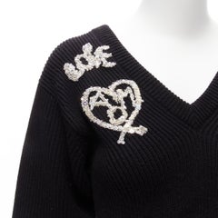 Alexander McQueen 2022 maglione a coste con logo nero e perline impreziosito da peplo S