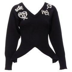 Alexander McQueen 2022 maglione a coste con logo nero e perline impreziosito da peplo S