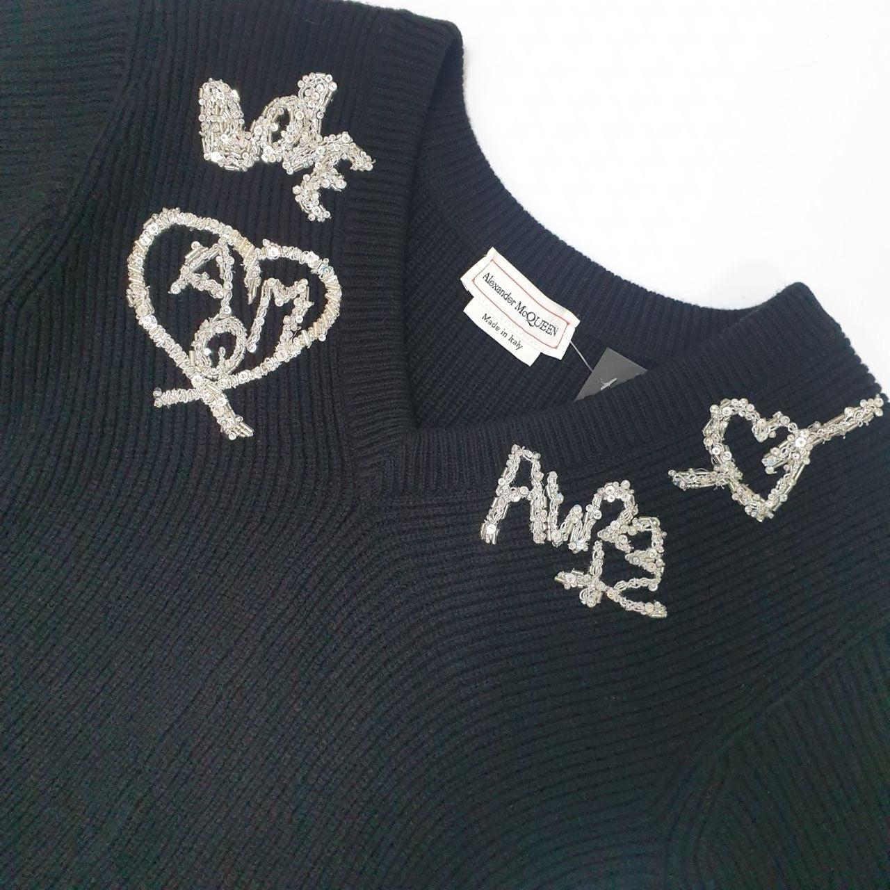 Noir Alexander McQueen 2022 black logo beads embellished peplum ribbed Sweater Sz.S en vente
