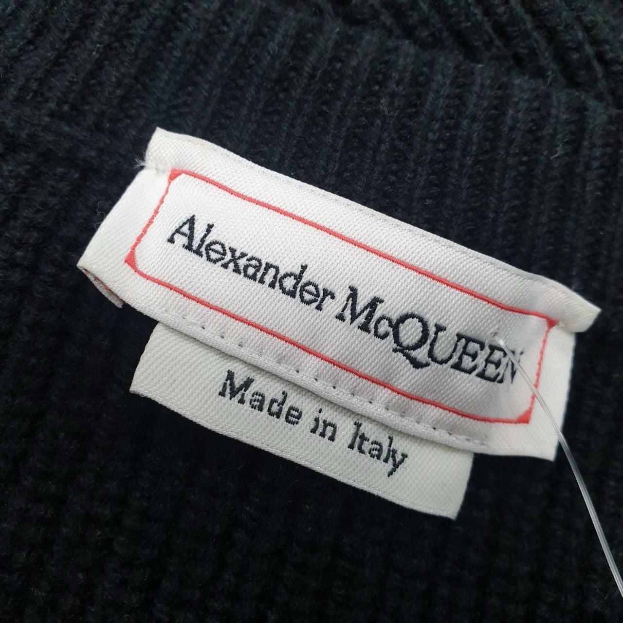 Alexander McQueen 2022 black logo beads embellished peplum ribbed Sweater Sz.S Excellent état - En vente à Krakow, PL