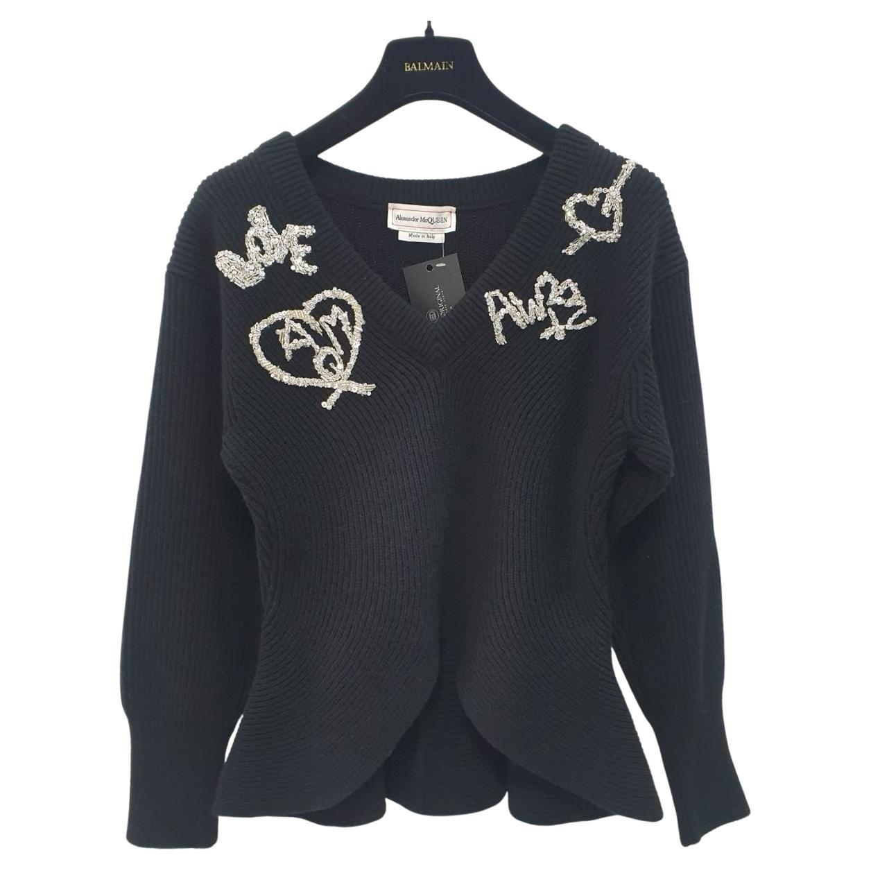 Alexander McQueen 2022 black logo beads embellished peplum ribbed Sweater Sz.S en vente