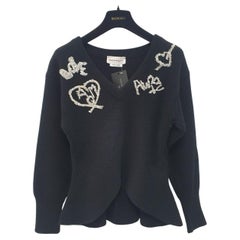 ALEXANDER MCQUEEN 2022 negro suéter peplum de canalé adornado con abalorios y logotipo Sz.S