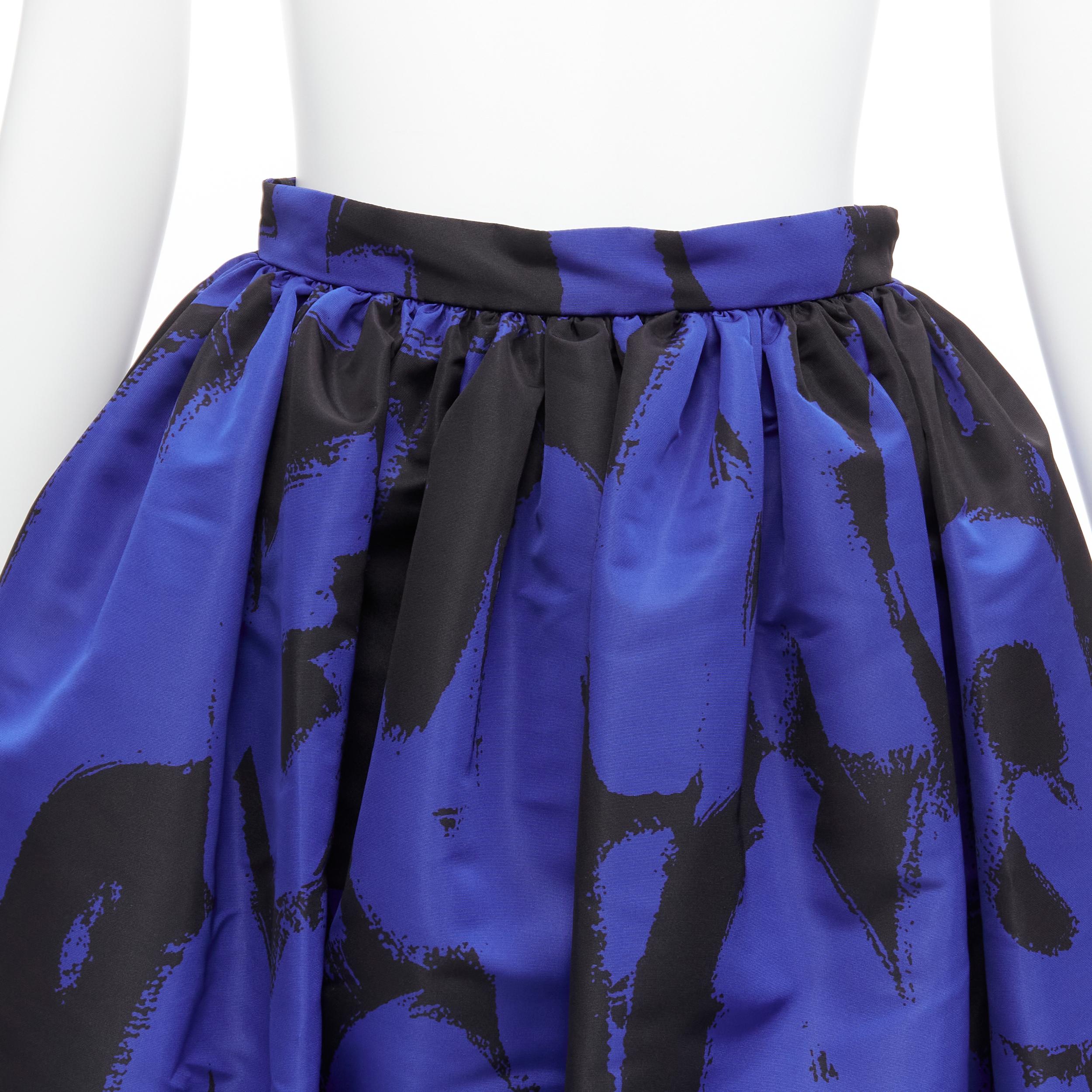 ALEXANDER MCQUEEN 2022 Brush Graffiti black blue logo letter print flared full skirt IT38 XS
Reference: AAWC/A00498
Brand: Alexander McQueen
Designer: Sarah Burton
Collection: 2022
Material: Polyester
Color: Blue, Black
Pattern: Abstract
Closure:
