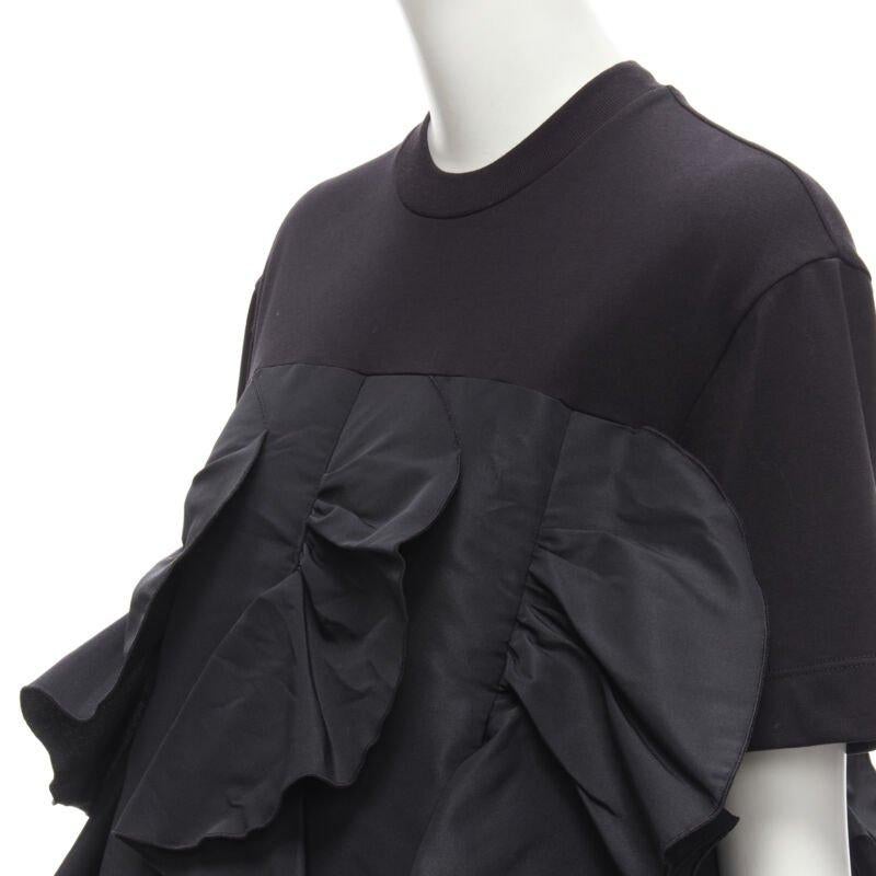 ALEXANDER MCQUEEN 2022 Hybrid white ruffle cotton tshirt layered dress IT38 S
Reference: AAWC/A00037
Brand: Alexander McQueen
Designer: Sarah Burton
Material: Cotton, Polyester
Color: Black
Pattern: Solid
Made in: Italy

CONDITION:
Condition: