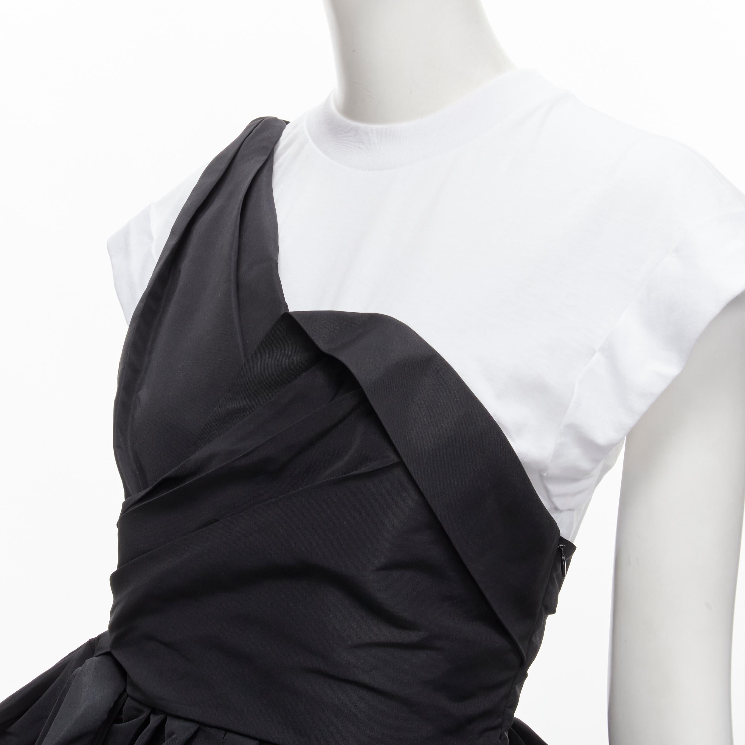 ALEXANDER MCQUEEN 2022 layered asymmetric crepe jersey peplum tshirt IT40 S
Brand: Alexander McQueen
Material: Polyester
Color: Black
Pattern: Solid
Closure: Zip
Extra Detail: Designed to look like a romantic crepe one shoulder peplum top was worn