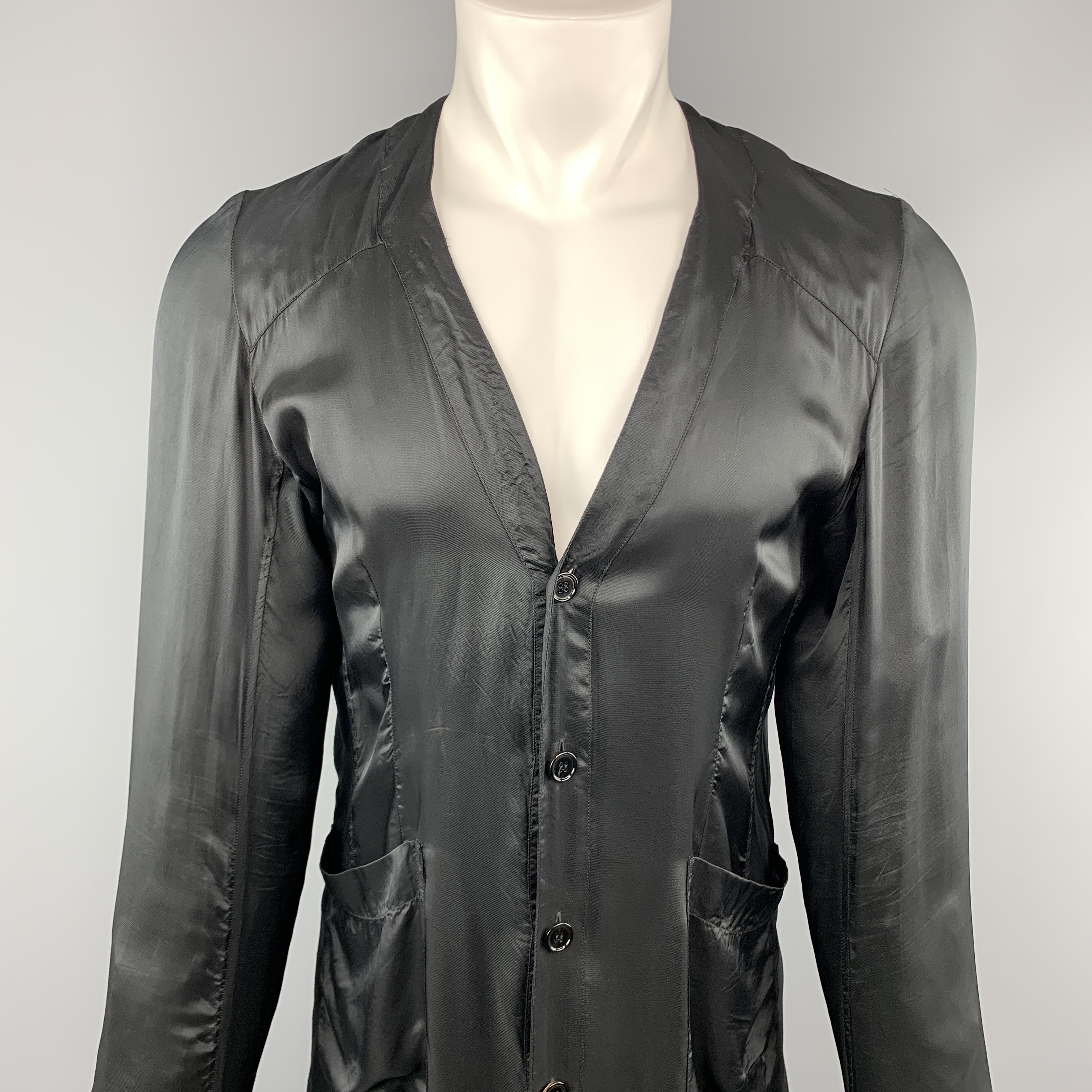 ALEXANDER MCQUEEN cardigan jacket comes in a light weight robe like satin with a deep V neckline, button up front, and patch pockets. Made in Romania.
 
Excellent Pre-Owned Condition.
Marked: IT 48
 
Measurements:
 
Shoulder: 17 in.
Chest: 42