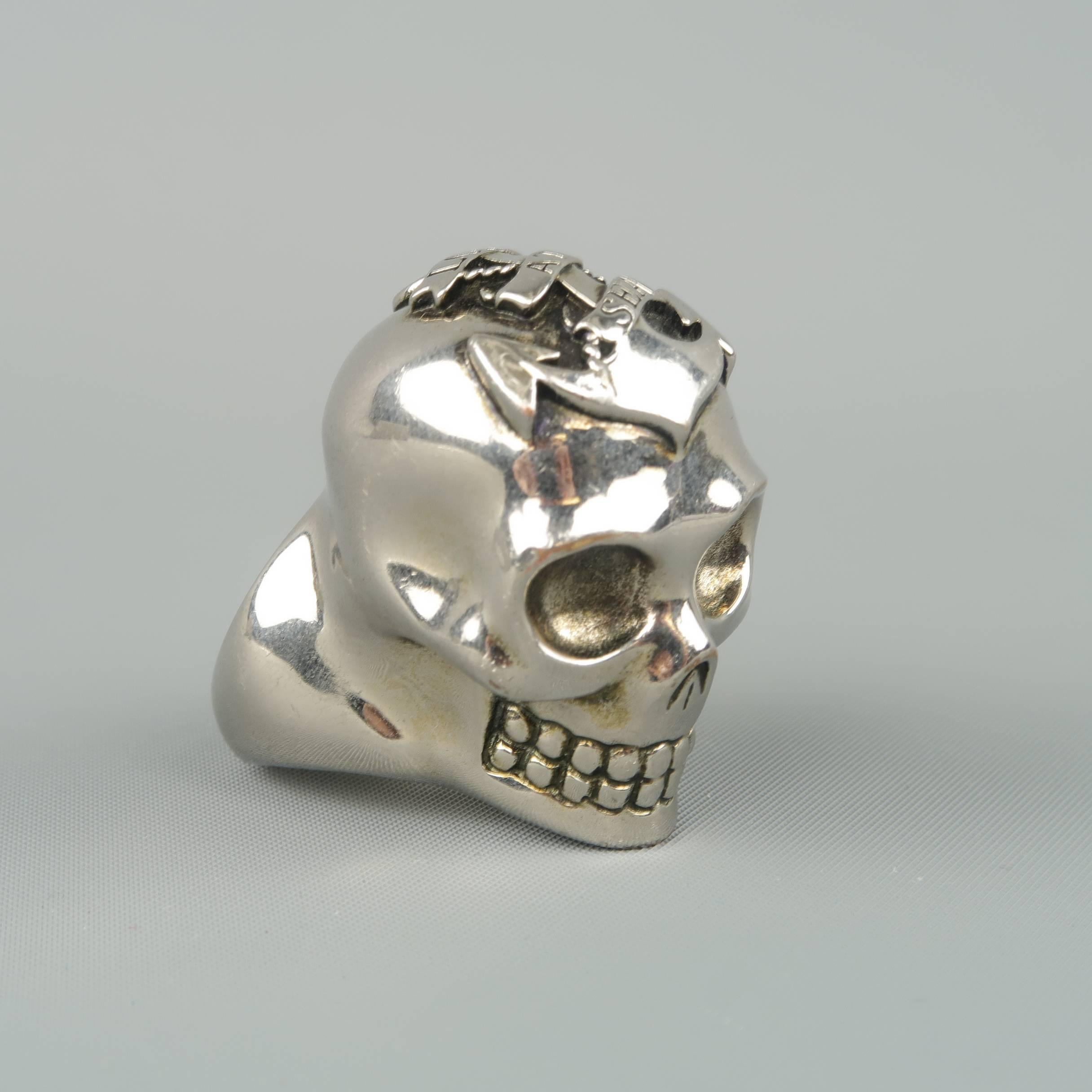 ALEXANDER MCQUEEN ring comes in polished silver tone metal and features an oversized engraved skull with 