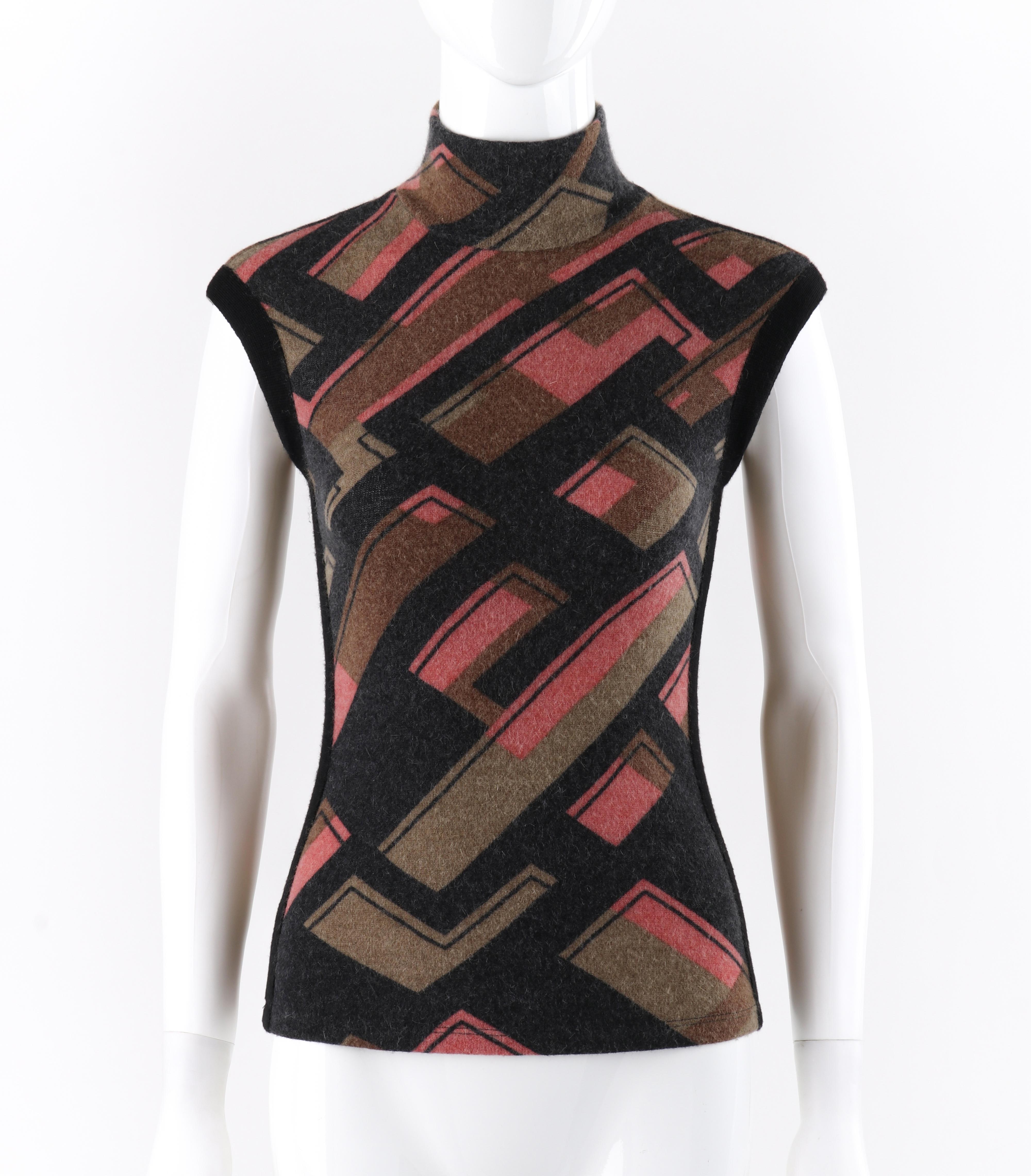 ALEXANDER McQUEEN A/W 1995 “Highland Rape” Multicolor Pattern Sleeveless Sweater
 
Brand / Manufacturer: Alexander McQueen
Collection: A/W 1995
Designer: Alexander McQueen
Style:  Sleeveless bottleneck sweater
Color(s): Shades of brown, gray, black,