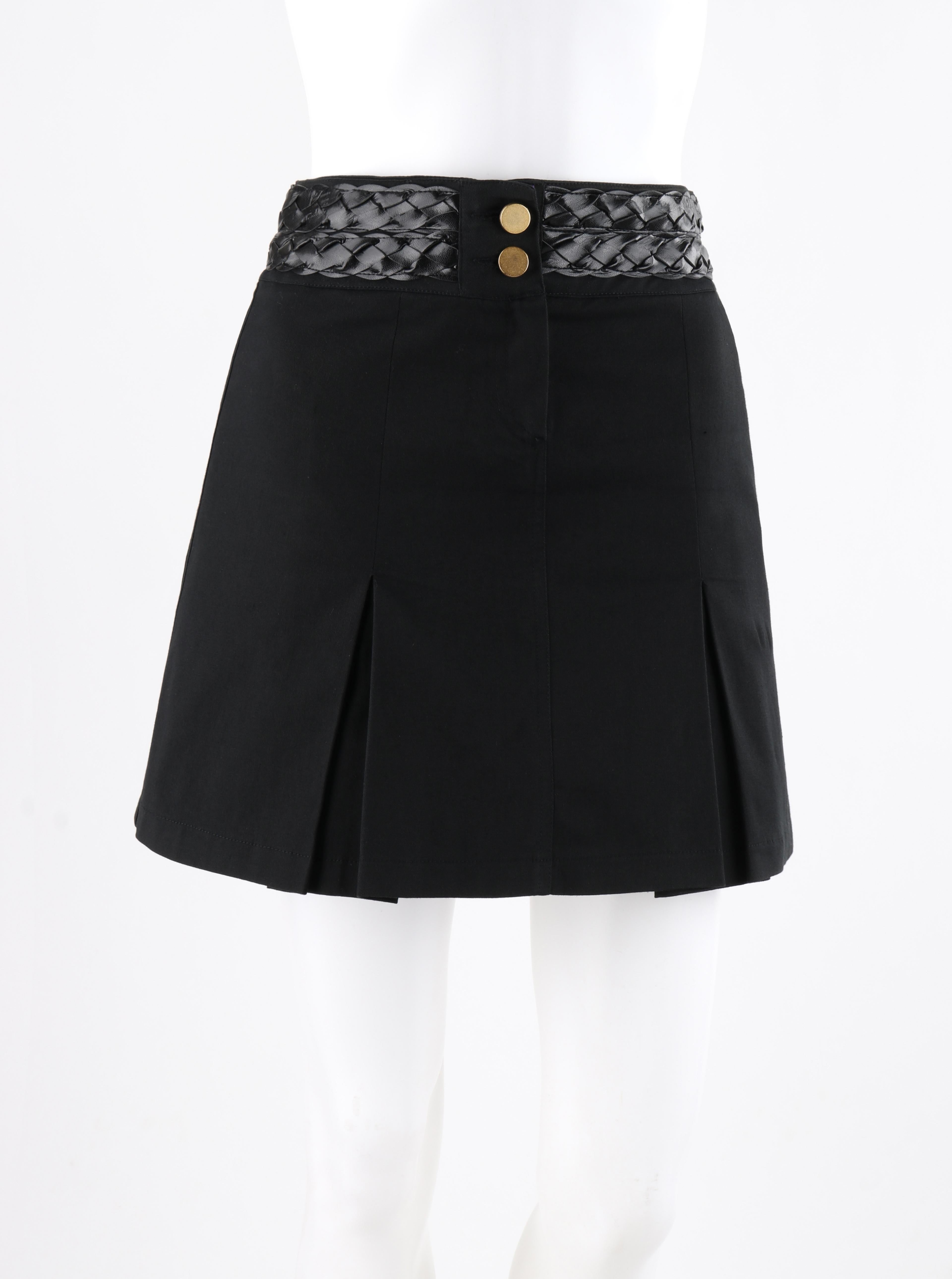 ALEXANDER McQUEEN A/W 1996 “Dante” Black Leather Braid Pleated Mini Skirt

Brand / Manufacturer: Alexander McQueen
Collection: A/W 1996 “Dante”
Designer: Alexander McQueen
Style: Pleated mini skirt
Color(s): Black
Lined: No
Marked Fabric Content: