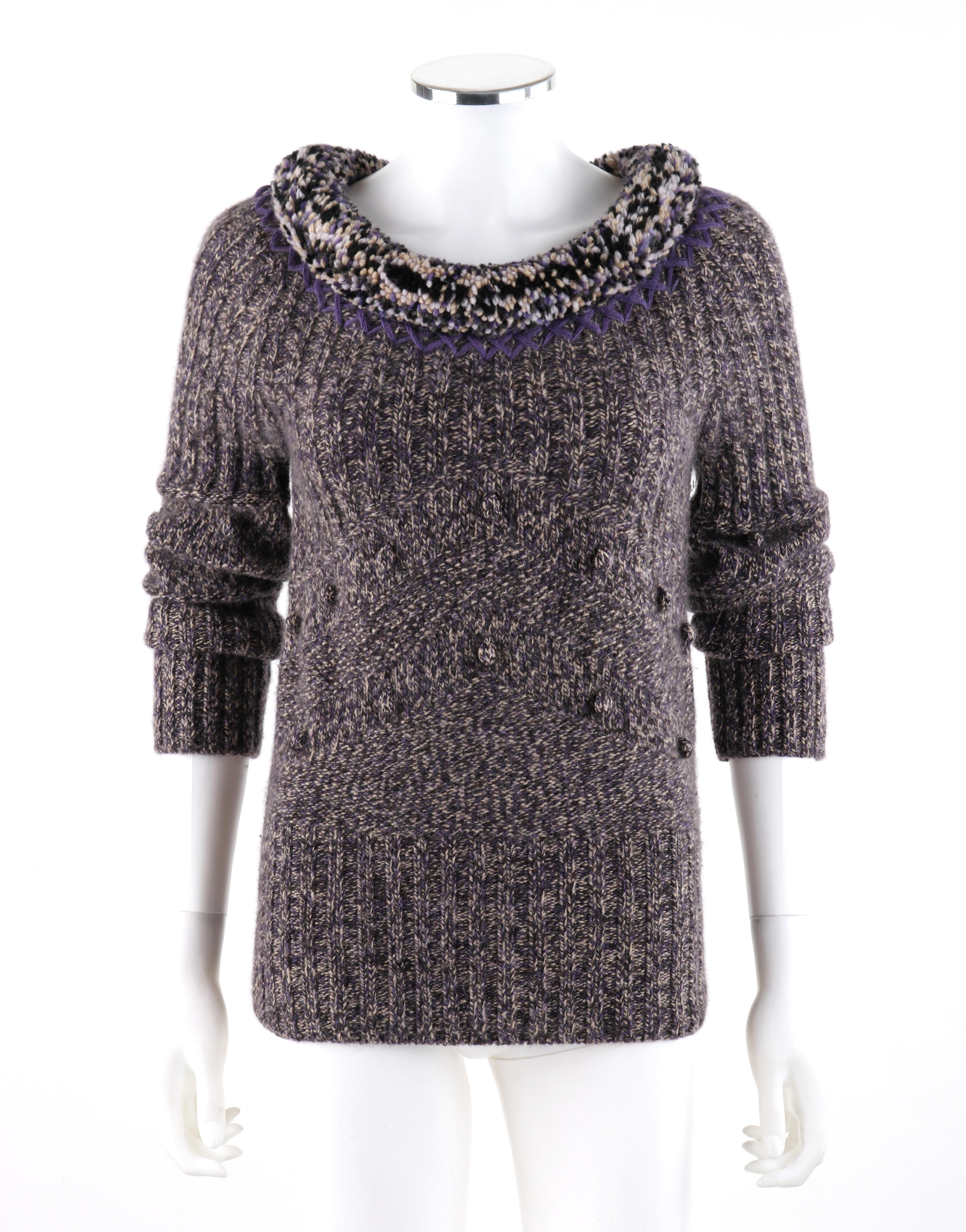 ALEXANDER McQUEEN A/W 2005 Scoop Neck Jumper Sweater With Pompom & Fringe Collar

Brand / Manufacturer: Alexander McQueen
Collection: A/W 2005
Designer: Alexander McQueen
Style: Scoop neck knit sweater with tall cuffed magyar sleeves
Color(s):