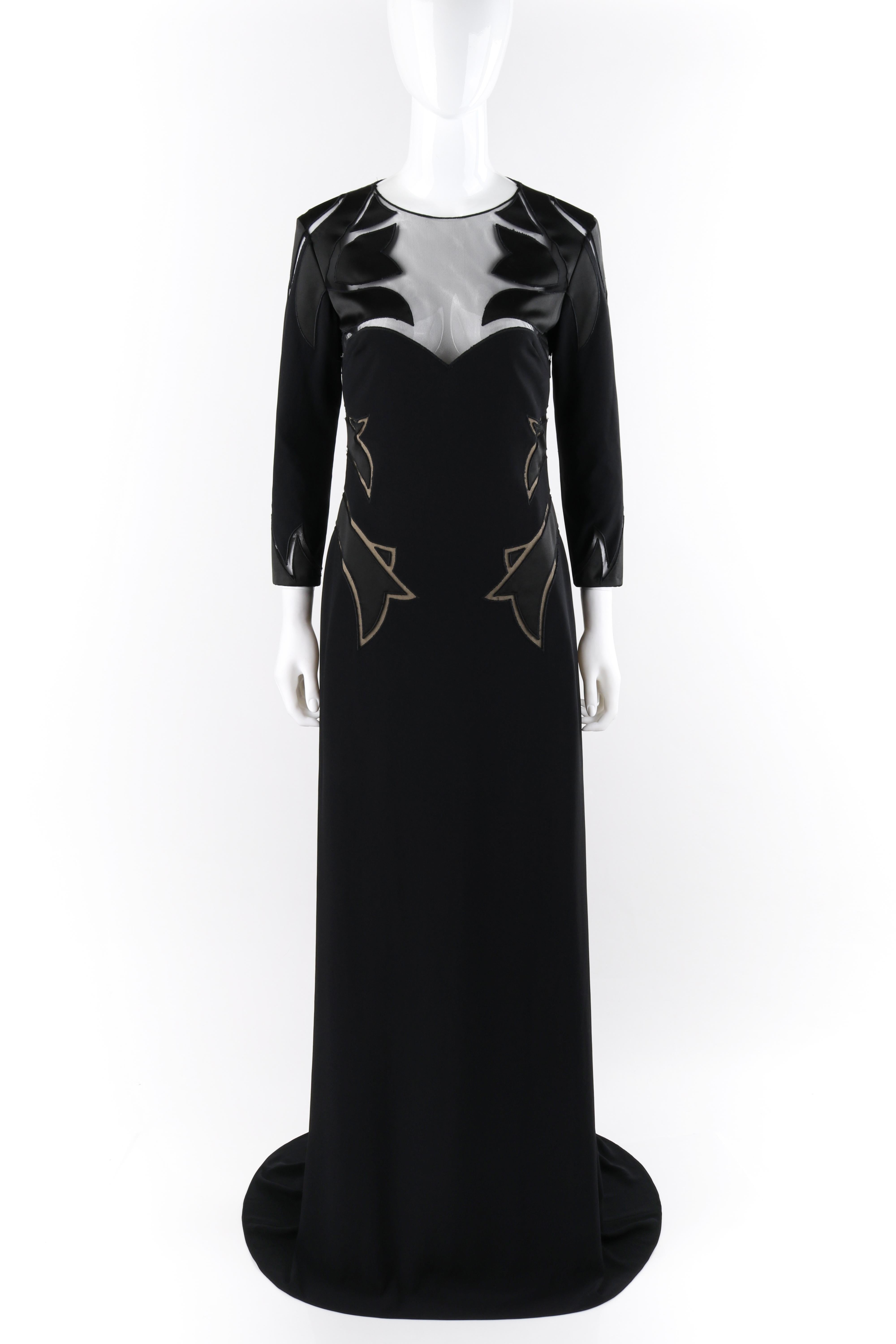 ALEXANDER McQUEEN A/W 2007 Black Sheer Long Sleeve Sweet Heart Gown
 
Brand / Manufacturer: Alexander McQueen
Collection: A/W 2007 
Style: Evening gown
Color(s): Shades of black and nude
Lined: Yes
Marked Fabric Content: 50% acetate, 50% viscose