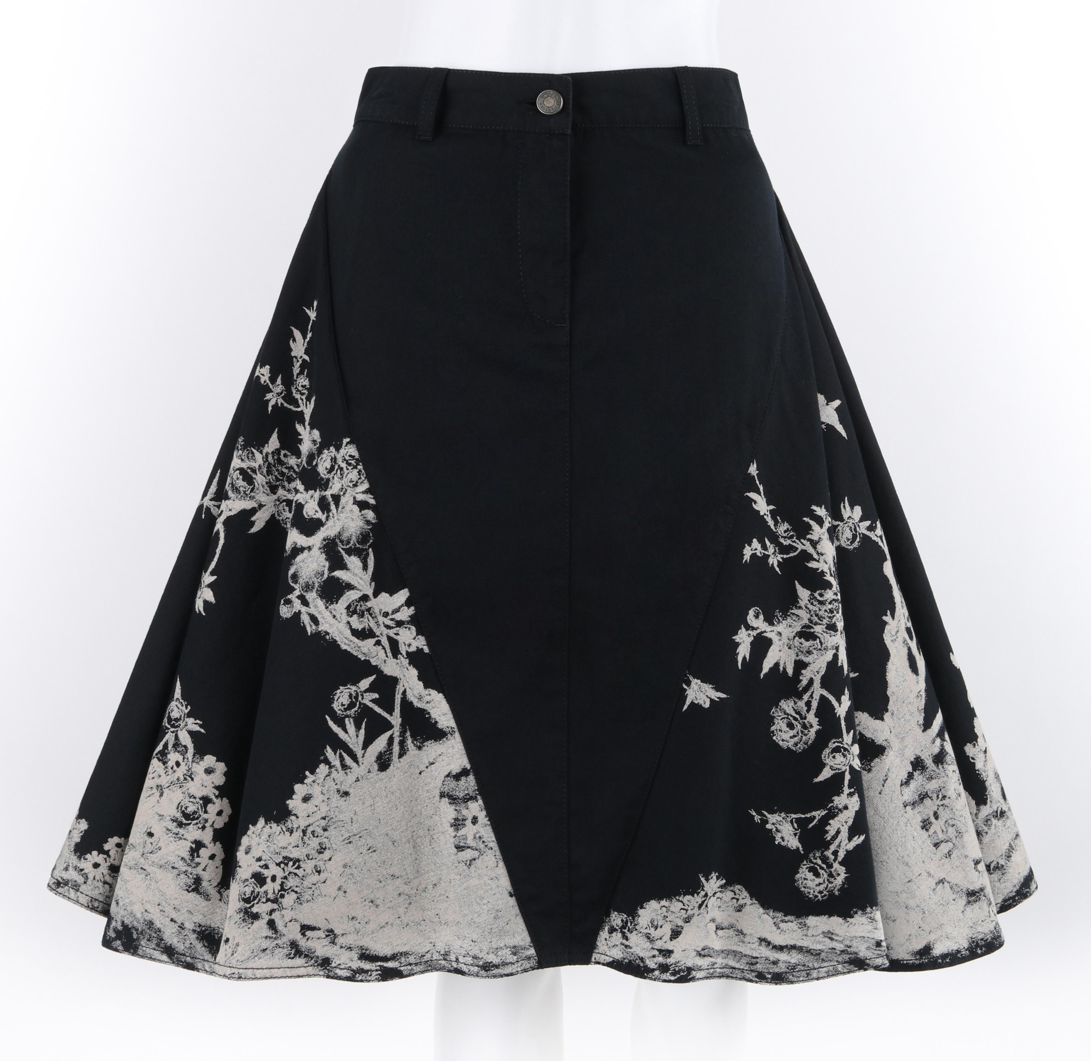 ALEXANDER McQUEEN A/W 2008 Black White Floral Peplum Illusion Circle Skirt

Brand / Manufacturer: Alexander McQueen
Collection: A/W 2008
Designer: Alexander McQueen
Style: Skirt
Color(s): Shades of black and white
Lined: No
Marked Fabric Content: