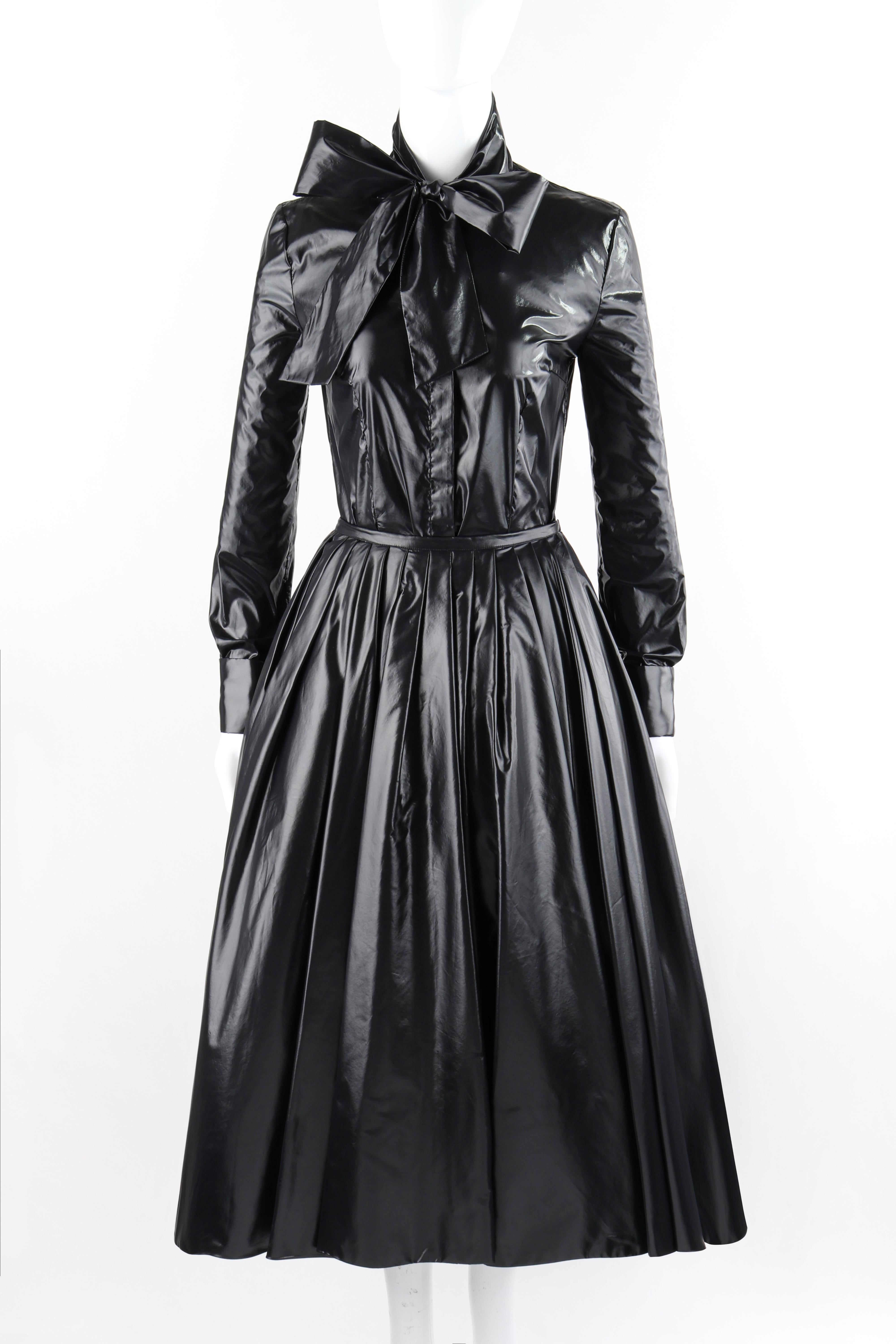 ALEXANDER McQUEEN A/W 2009 “The Horn Of Plenty” Black Trash Bag Shirt Skirt Set

Brand / Manufacturer: Alexander McQueen
Collection: A/W 2009 “The Horn Of Plenty”- Runway looks #32, #16
Designer: Alexander McQueen 
Style: Tie-neck blouse; pleated