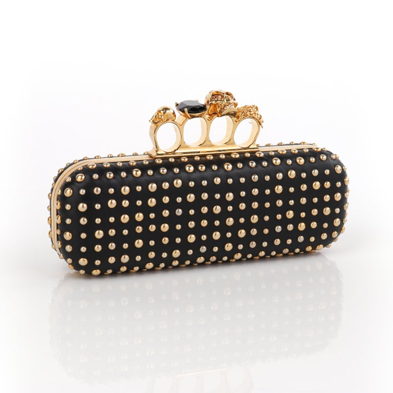 ALEXANDER MCQUEEN A/W 2010 Gold Studded Leather Four-Ring Skull Knuckle  Clutch For Sale at 1stDibs