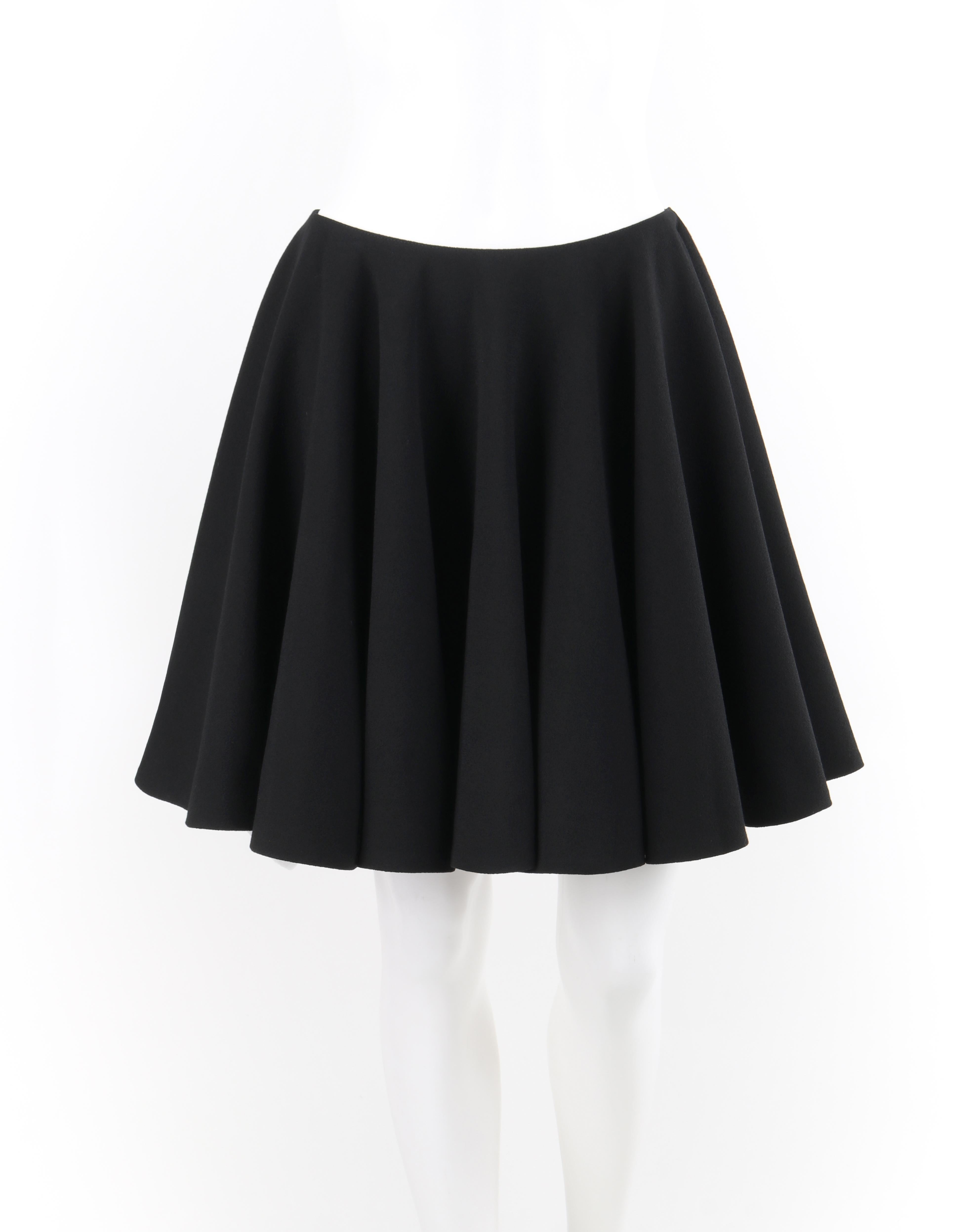 Brand / Manufacturer: Alexander McQueen
Collection: A/W 2012
Designer: Sarah Burton
Style: Above-the-knee skirt
Color(s): Shades of black
Lined: Yes
Marked Fabric Content: 