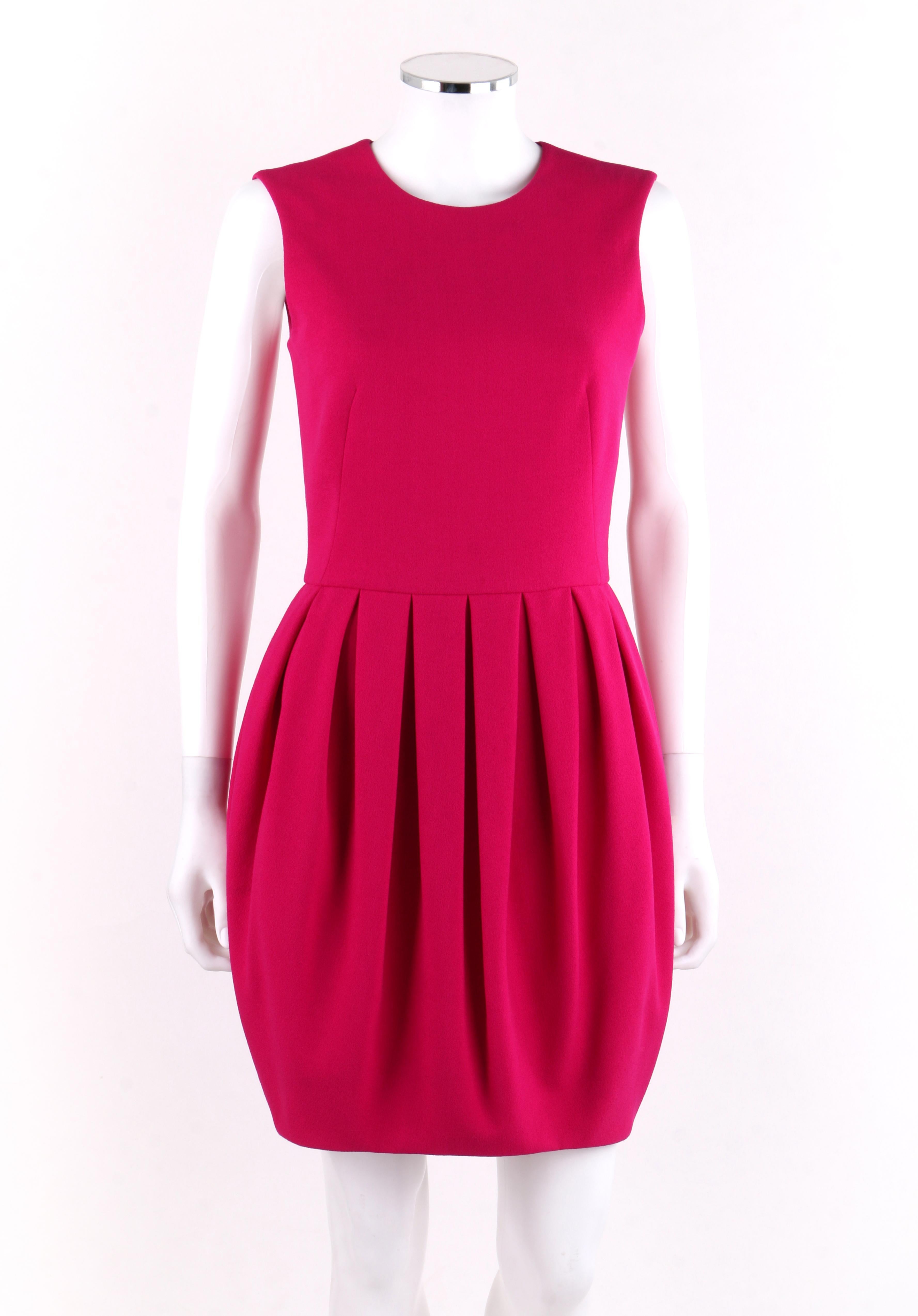 ALEXANDER McQUEEN A/W 2012 Fuchsia Pink Wool Bubble Pegged Tank Mini Dress Size 40  
 
Estimated Retail: $2,240
 
Brand / Manufacturer: Alexander McQueen 
Collection: Autumn / Winter 2012 
Style: Fitted dress
Color(s): Fuchsia pink
Lined: Yes