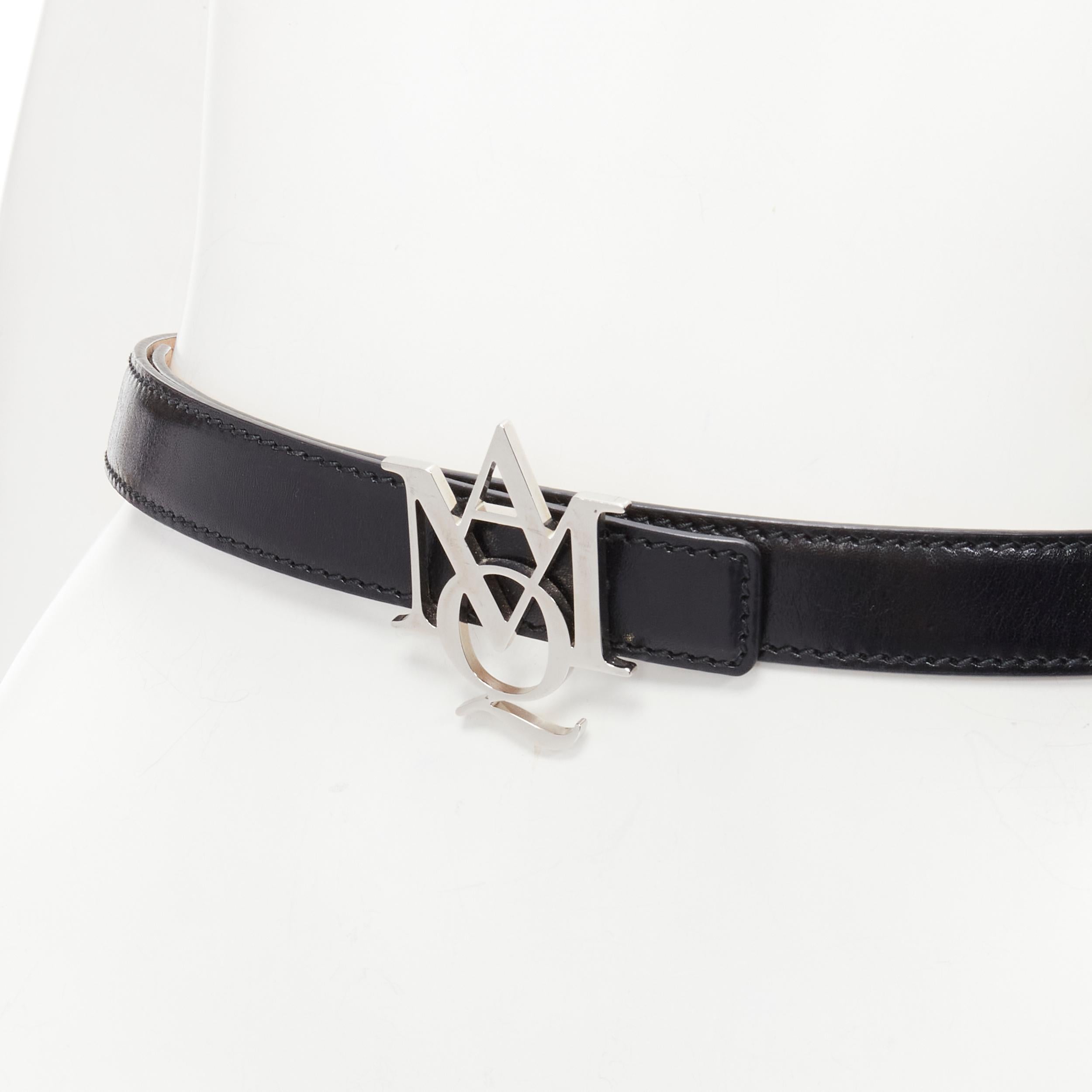 ALEXANDER MCQUEEN AMG silver buckle black skinny belt 75cm
Brand: Alexander McQueen
Material: Leather
Color: Black
Pattern: Solid
Closure: Pin
Made in: Italy

CONDITION:
Condition: Very good, this item was pre-owned and is in very good condition.