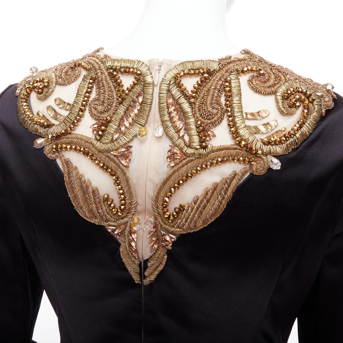 ALEXANDER MCQUEEN AW2010 Angels Demons black gold bead structural dress IT40 S
Reference: NKLL/A00263
Brand: Alexander McQueen
Designer: Lee Alexander McQueen
Collection: FW 2010 Angels & Demons
Material: Silk
Color: Black, Gold
Pattern: