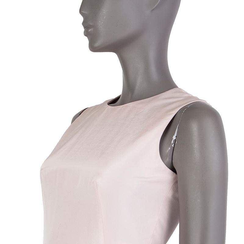 Alexander McQueen sheath dress in baby pink silk (100%). With pleated skirt. Closes with hook and invisible zipper on the back. Lined baby pink silk (100%). Has been worn and is in excellent condition. 

Tag Size 36
Size XXS
Shoulder Width 35cm