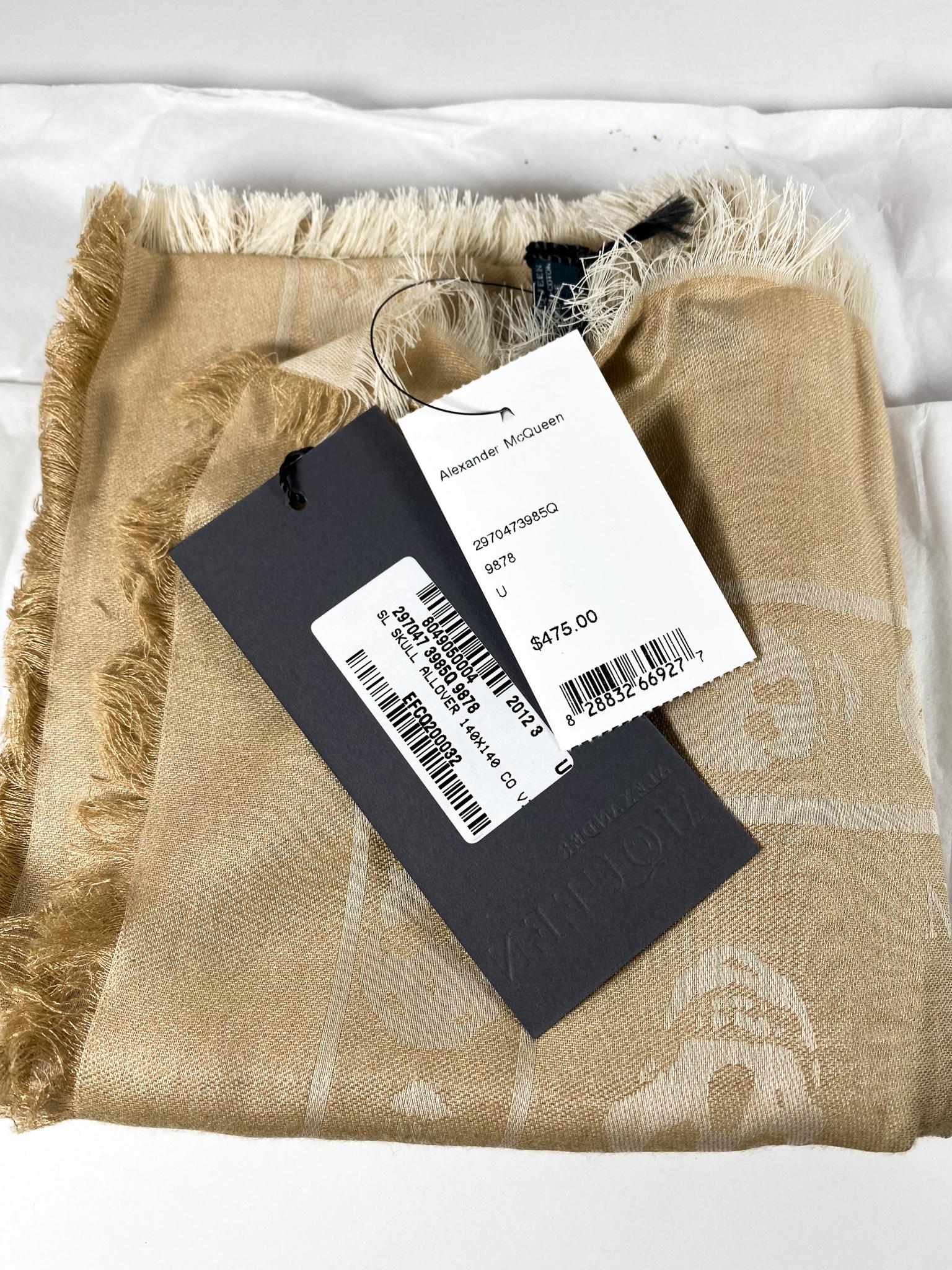 Alexander McQueen's classic big silk skull scarf in beige and white. This scarf was purchased in 2012, and is still in its original box with tags attached. 

Condition: Great condition, never used, new with tags. 
Exterior: 
Interior:
Made In: