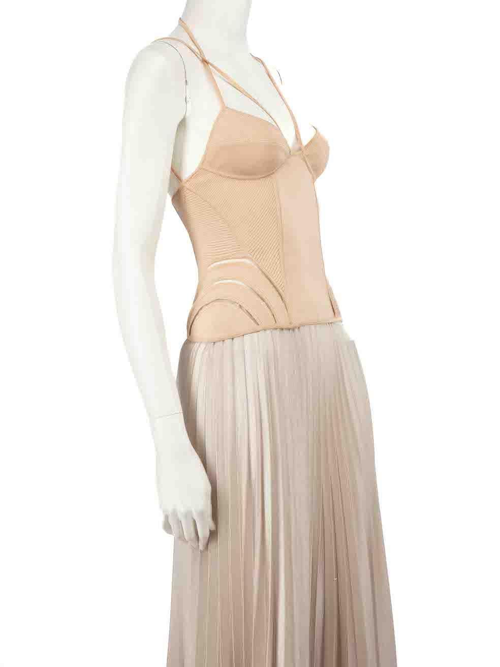 CONDITION is Very good. Minimal wear to top is evident. Minimal pulls to fabric on front central panel and on back left triangular panel on this used Alexander McQueen designer resale item.
 
 
 
 Details
 
 
 Beige
 
 Viscose
 
 Tank top
 
 Boned
