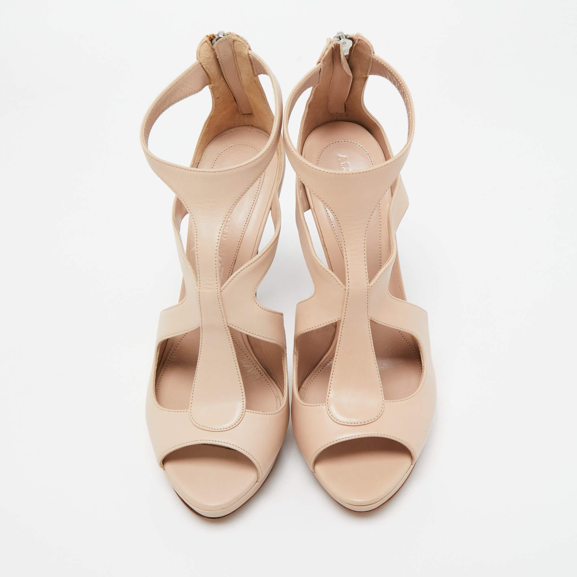 Wonderfully crafted shoes added with notable elements to fit well and pair perfectly with all your plans. Make these Alexander McQueen beige sandals yours today!

Includes: Original Box, Info Booklet

