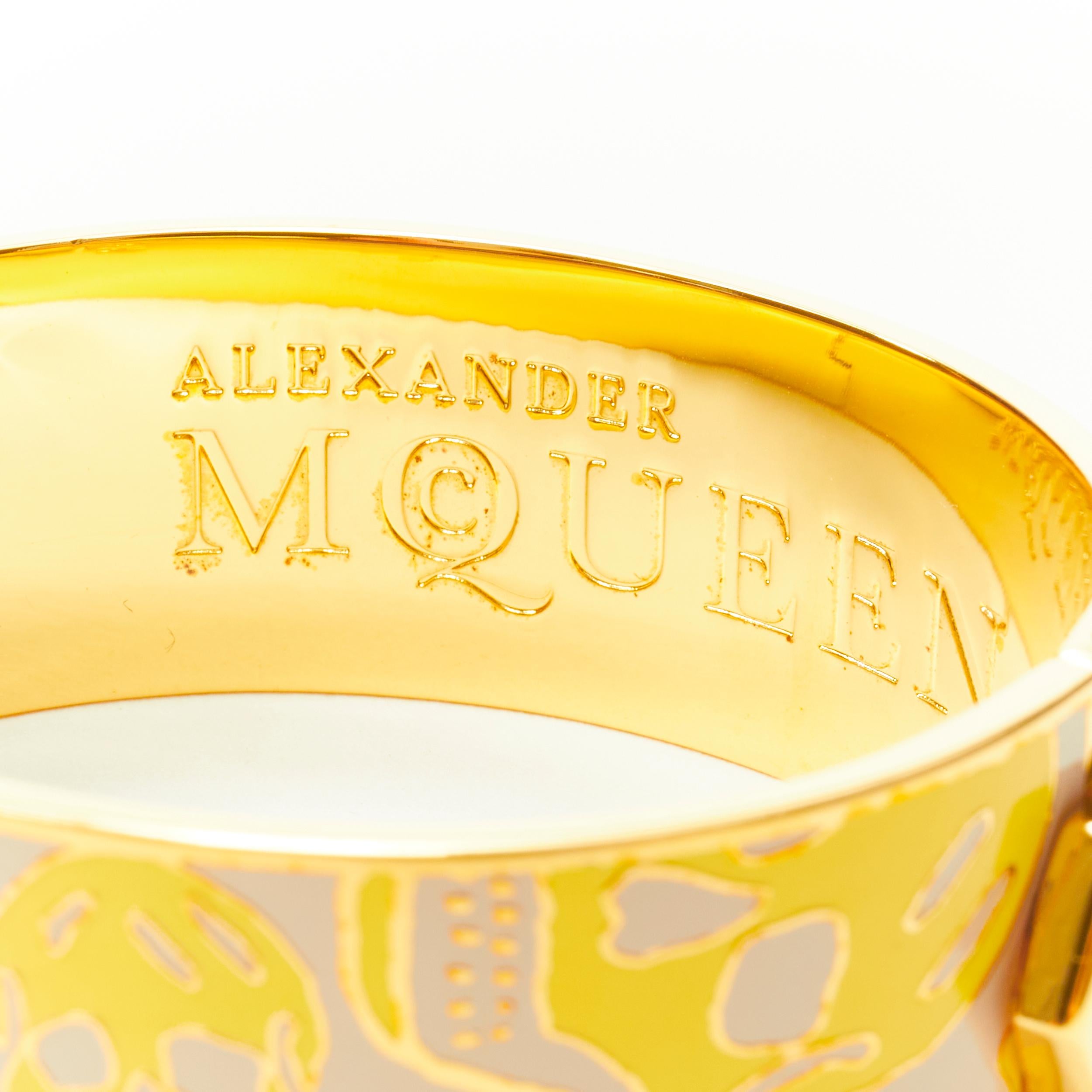 Women's ALEXANDER MCQUEEN beige yellow skull enamel gold tone brass bangle cuff For Sale