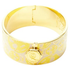 ALEXANDER MCQUEEN - Bracelet manchette tête de mort en émail jaune beige et laiton doré