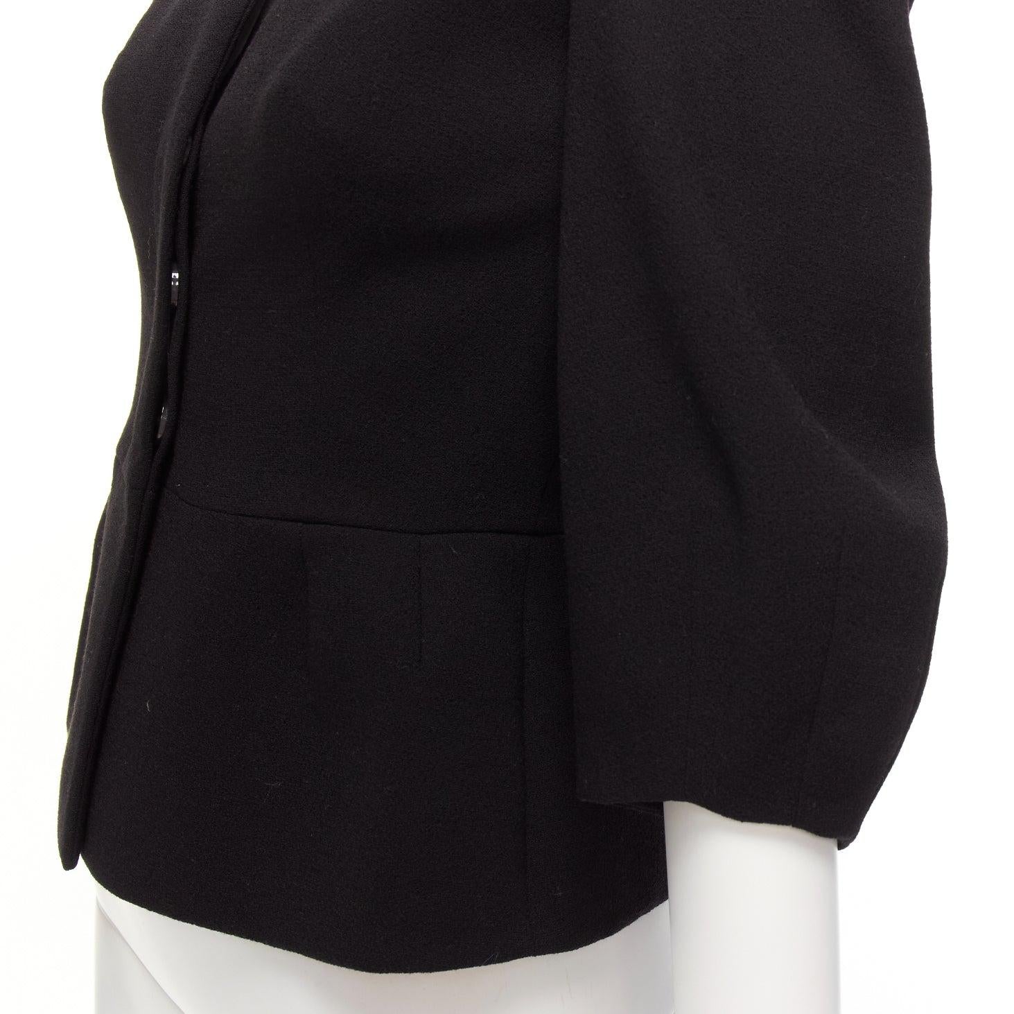 ALEXANDER MCQUEEN black 100% wool cropped sleeve peplum jacket IT38 XS
Reference: EALU/A00015
Brand: Alexander McQueen
Material: Wool
Color: Black
Pattern: Solid
Closure: Button
Lining: Black Fabric
Extra Details: Peplum back.
Made in: