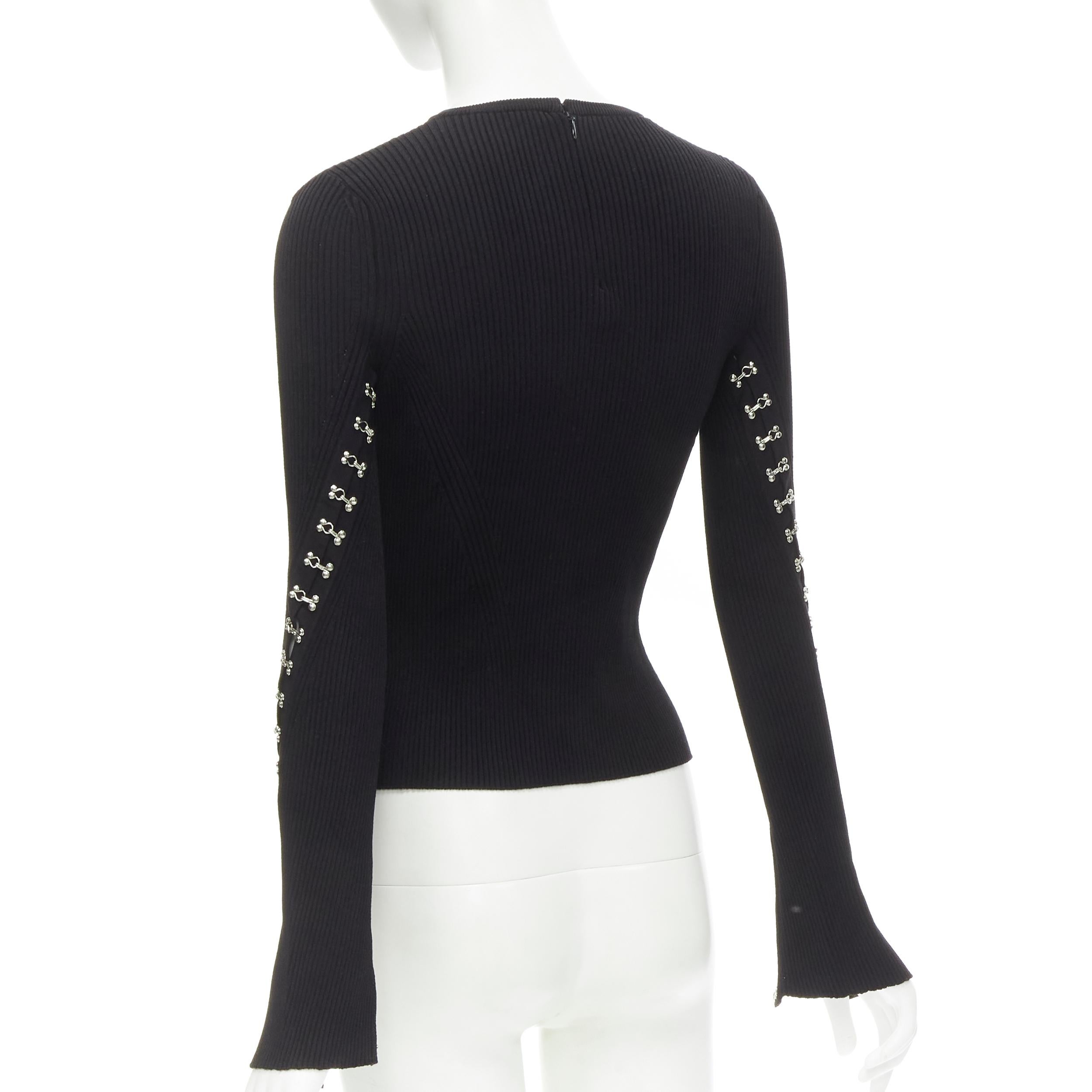 Black ALEXANDER MCQUEEN black body-con ribbed silver butterfly eyelet cuff cropped top