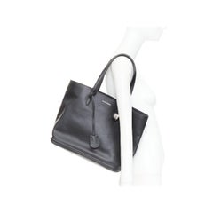 ALEXANDER MCQUEEN black calfskin leather silver skull lock tote bag