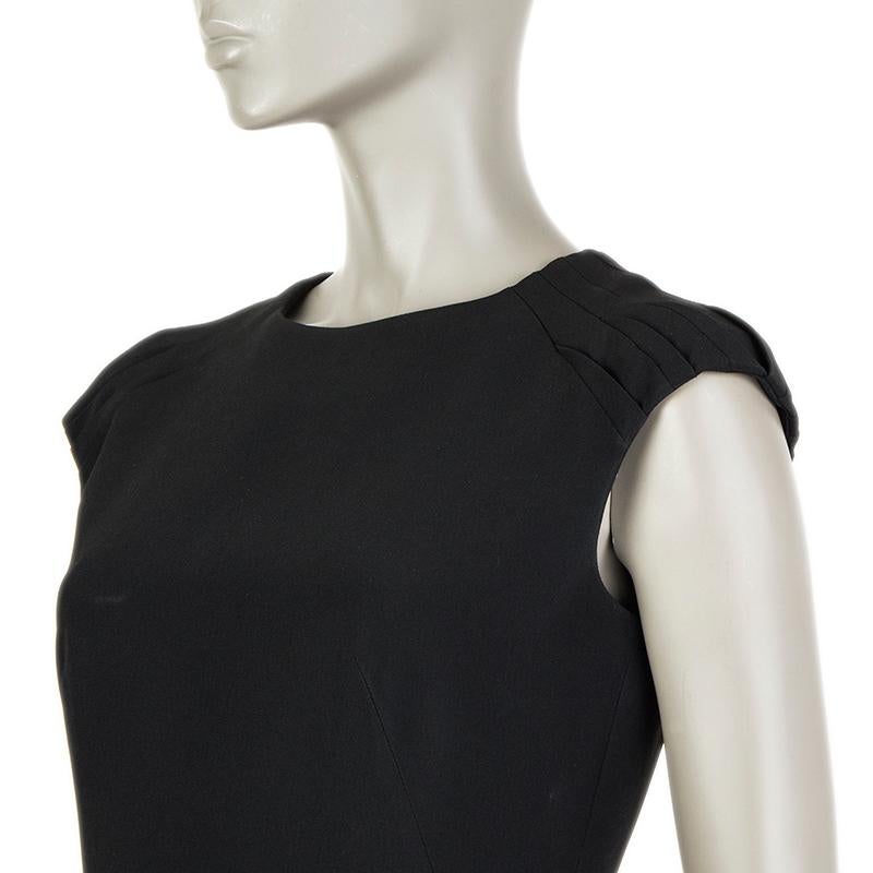 Alexander McQueen cap-sleeve cocktail dress in black acetate (50%) and viscose (50%). Opens with zipper on the back. Lined in black acetate (74%) and silk (26%). Has been worn and is in excellent condition.

Tag Size 40
Size S
Bust To 90cm