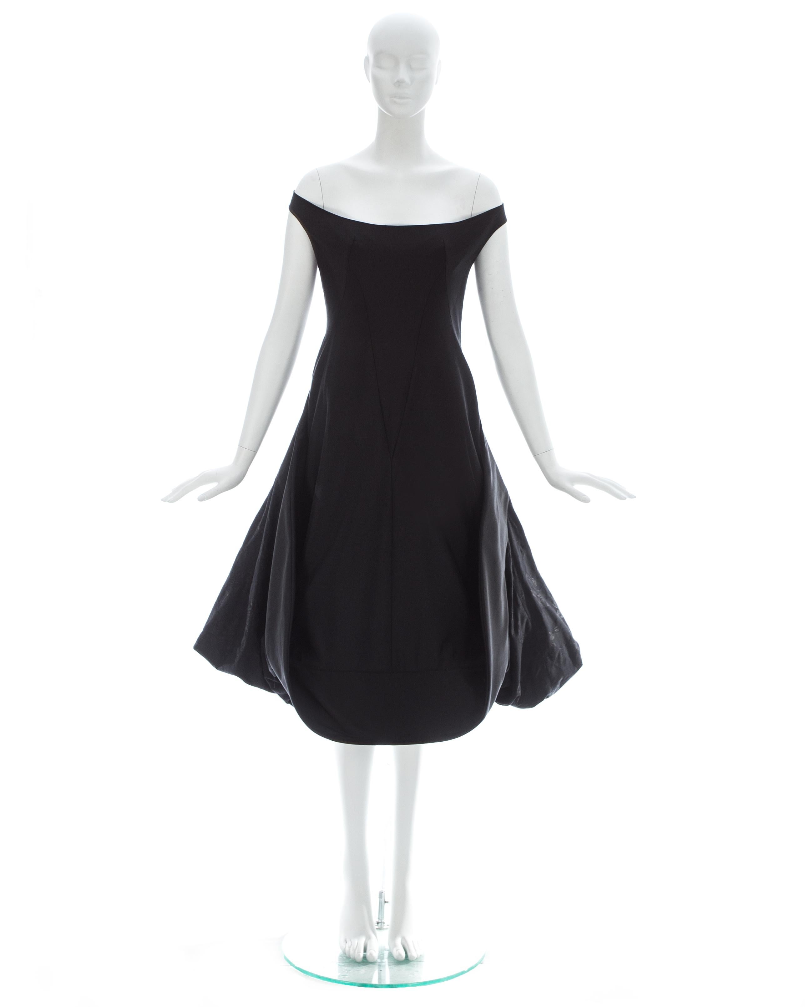 Alexander McQueen; Black cotton polyamide cocktail dress with floral brocade bustle at the rear and off the shoulder strap 

Spring-Summer 2002 