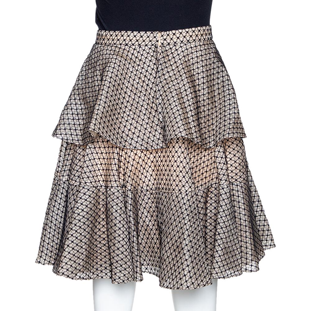 This Alexander McQueen skirt will elevate your look from off-duty to party in an instant. It has a comfortable waist, lace overlay and a hem that falls in tiers. Style it with an elegant blouse and slingbacks.

