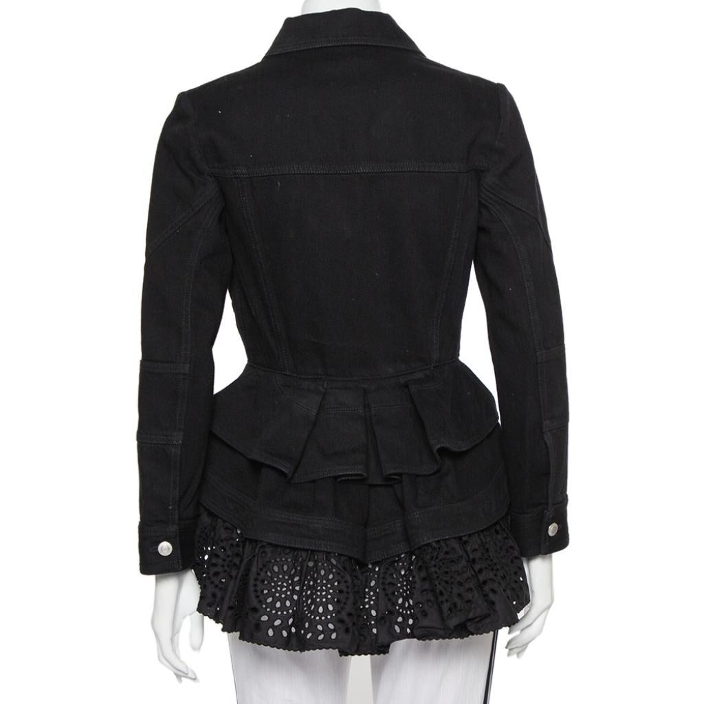 Polish your style with this Alexander McQueen jacket. Designed in a peplum shape, this elegant denim creation flaunts great tailoring signs, front fastenings, and an embroidered lace hem. The perfect fit of this black jacket promises a striking