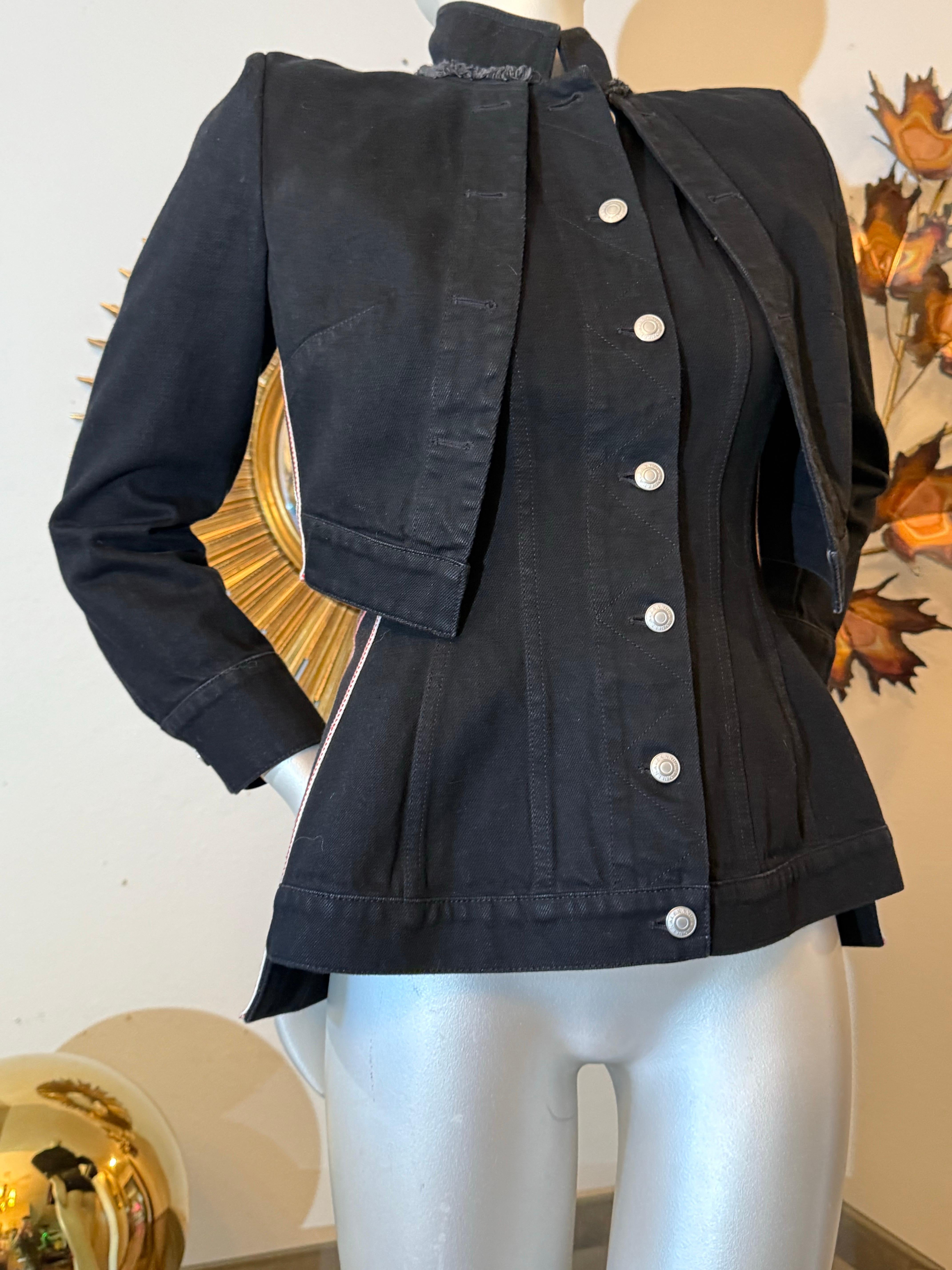 Alexander McQueen Black Denim Jacket w Integral Overlay and Stripes at Sides:  A wonderful Avant Garde denim jacket with double layer construction.  Under-layer is seamed and shaped in an hourglass design while the over layer is a straight-cut